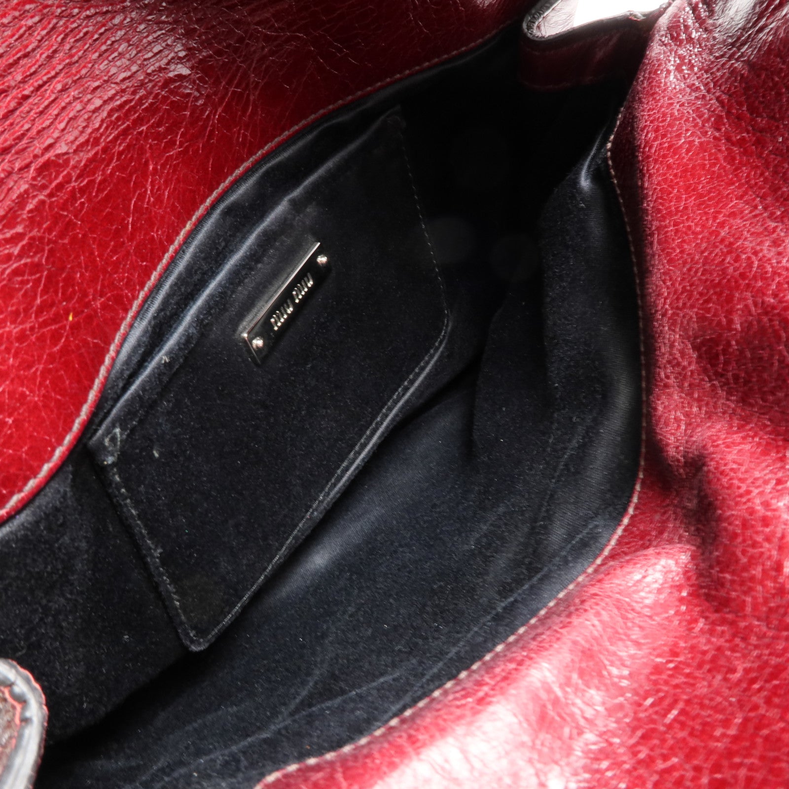 Miu Miu 牛皮皮革Clutch Bag銀扣手拿包