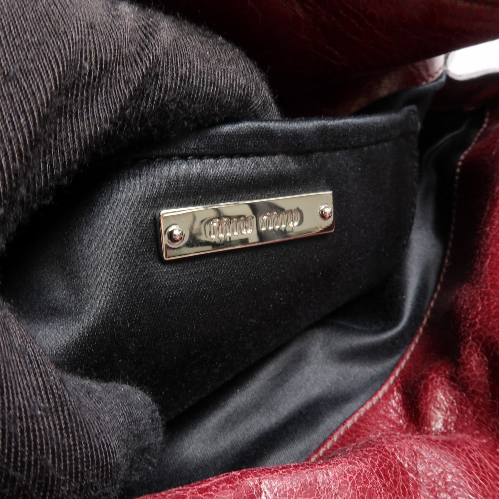 Miu Miu 牛皮皮革Clutch Bag銀扣手拿包