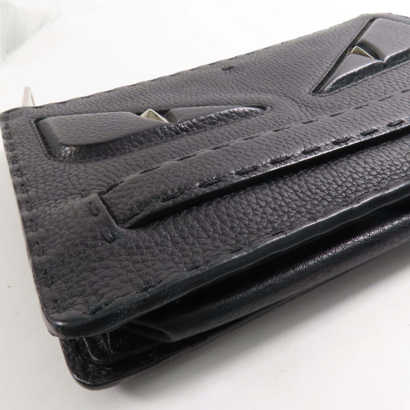 FENDI 牛皮皮革Eye Monster銀扣手拿包