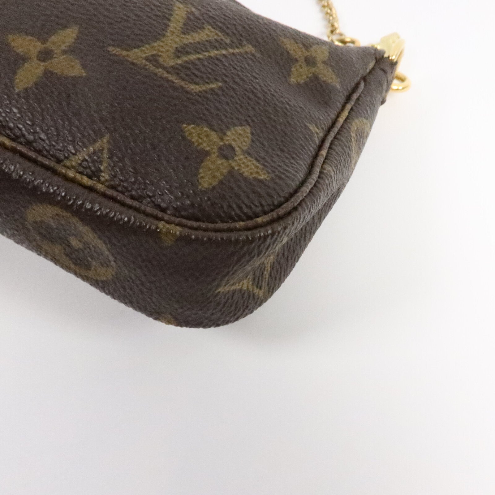 LOUIS VUITTON Monogram Mini Pochette Accessoires金扣手挽袋