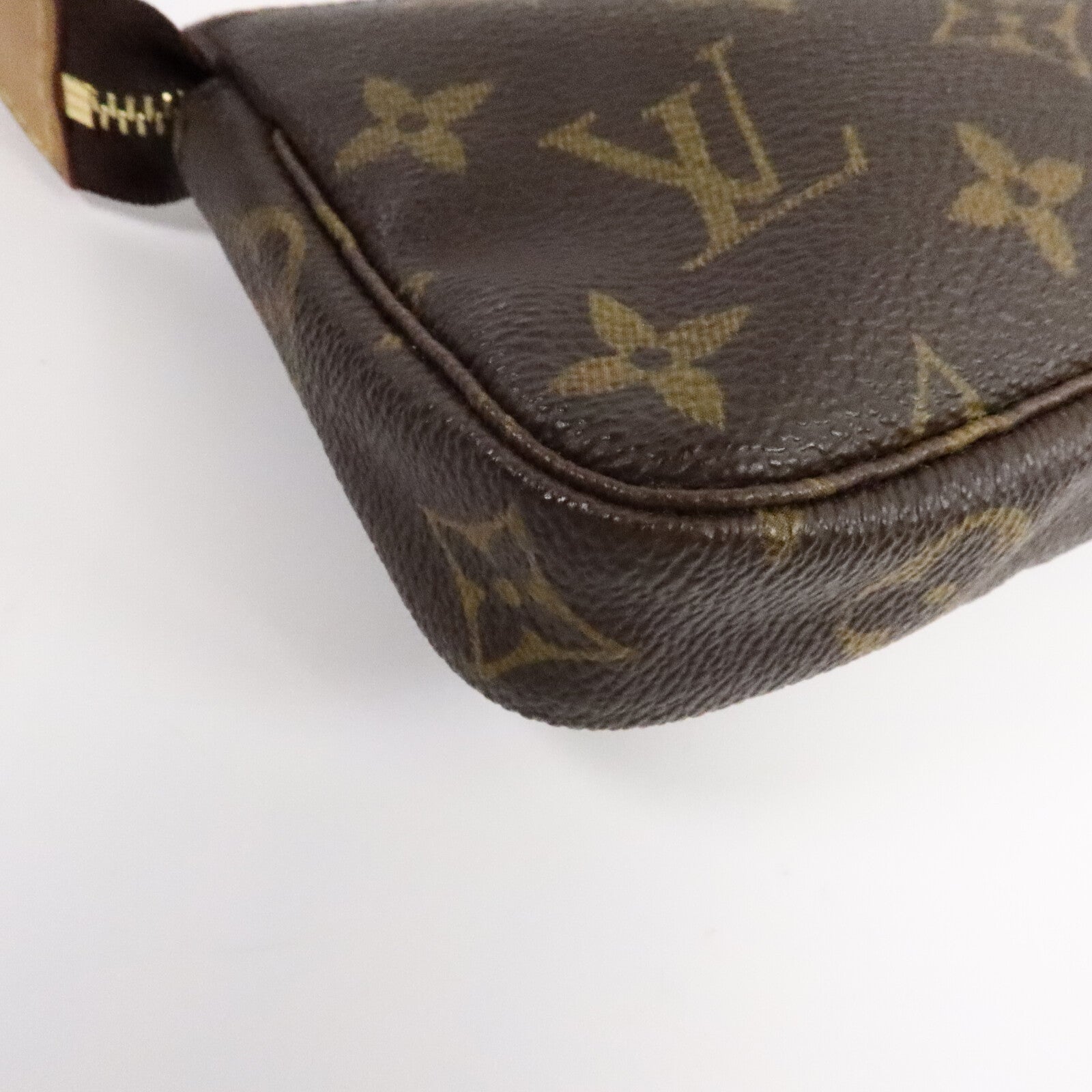 LOUIS VUITTON Monogram Mini Pochette Accessoires金扣手挽袋