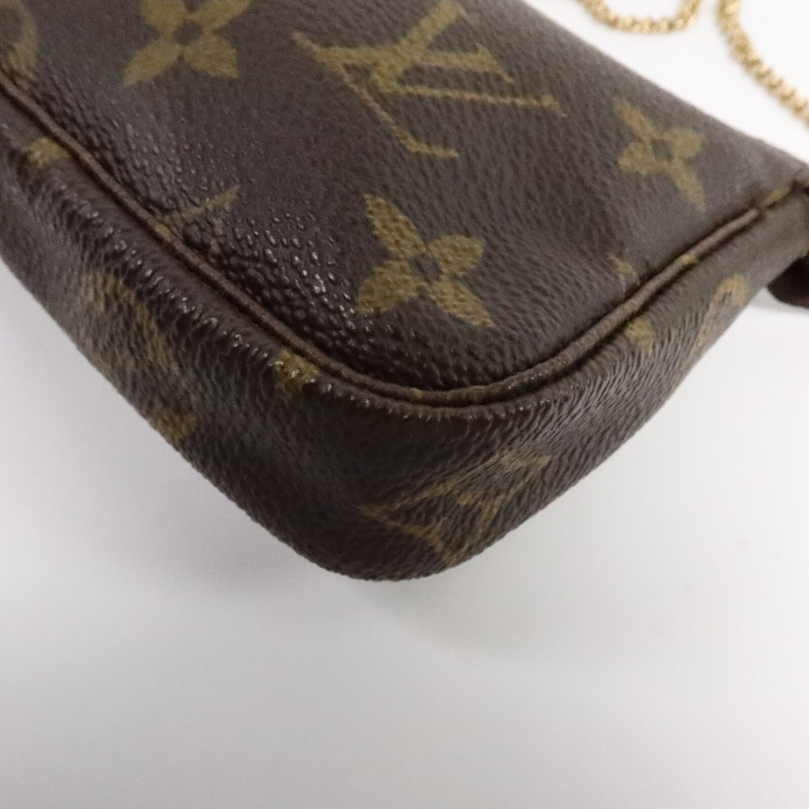 LOUIS VUITTON Monogram Mini Pochette Accessoires金扣手挽袋