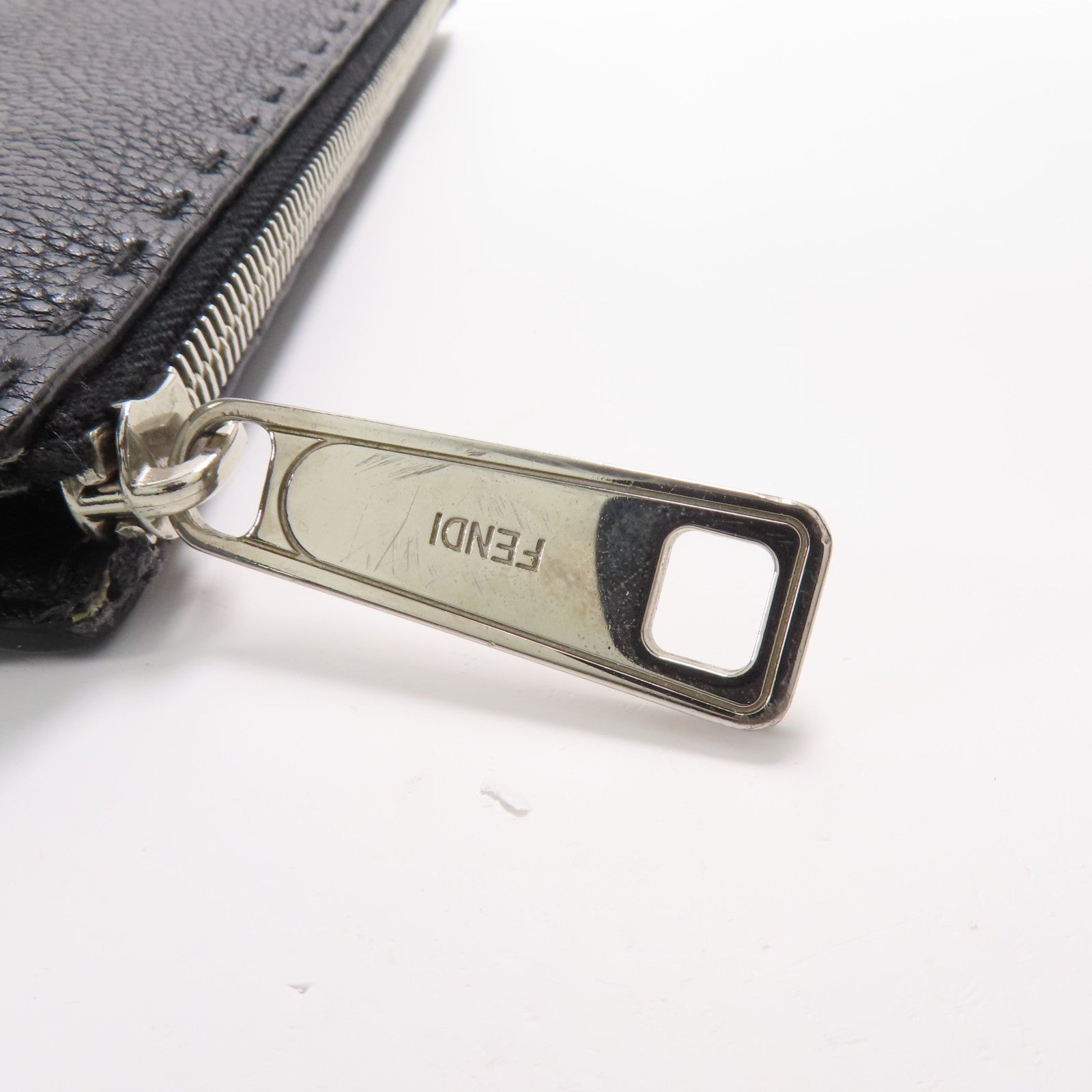 FENDI 牛皮皮革Eye Monster銀扣手拿包