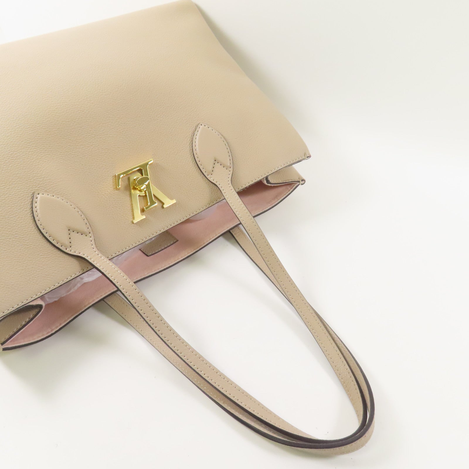LOUIS VUITTON 牛皮皮革Lockme Shopper Tote金扣肩背袋