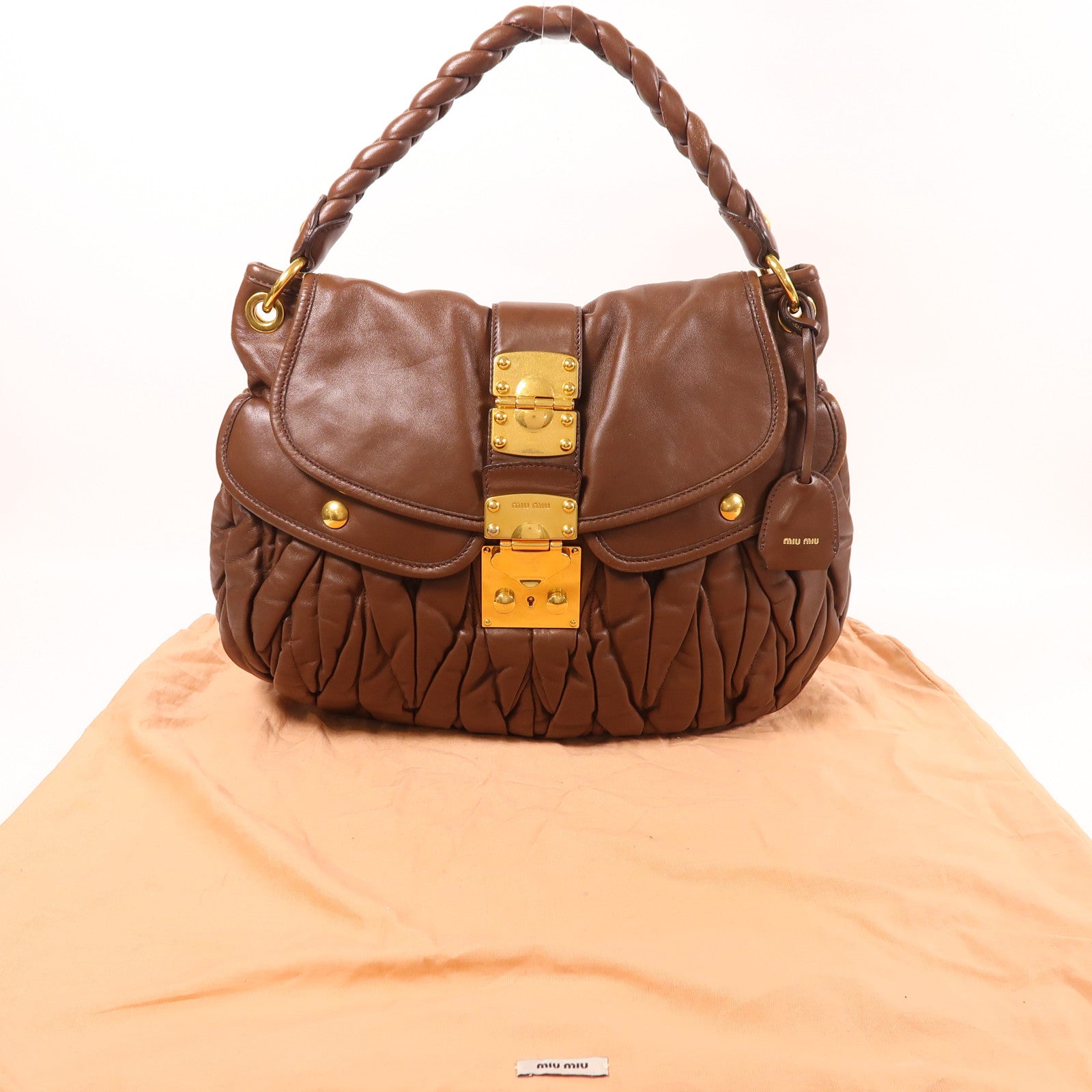 Miu Miu 牛皮皮革Coffer金扣肩背袋