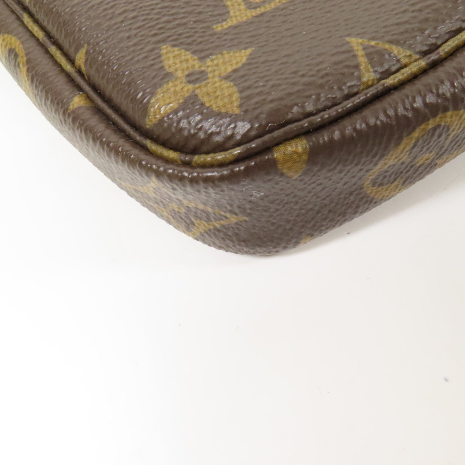 LOUIS VUITTON Monogram Mini Pochette Accessoires金扣手挽袋
