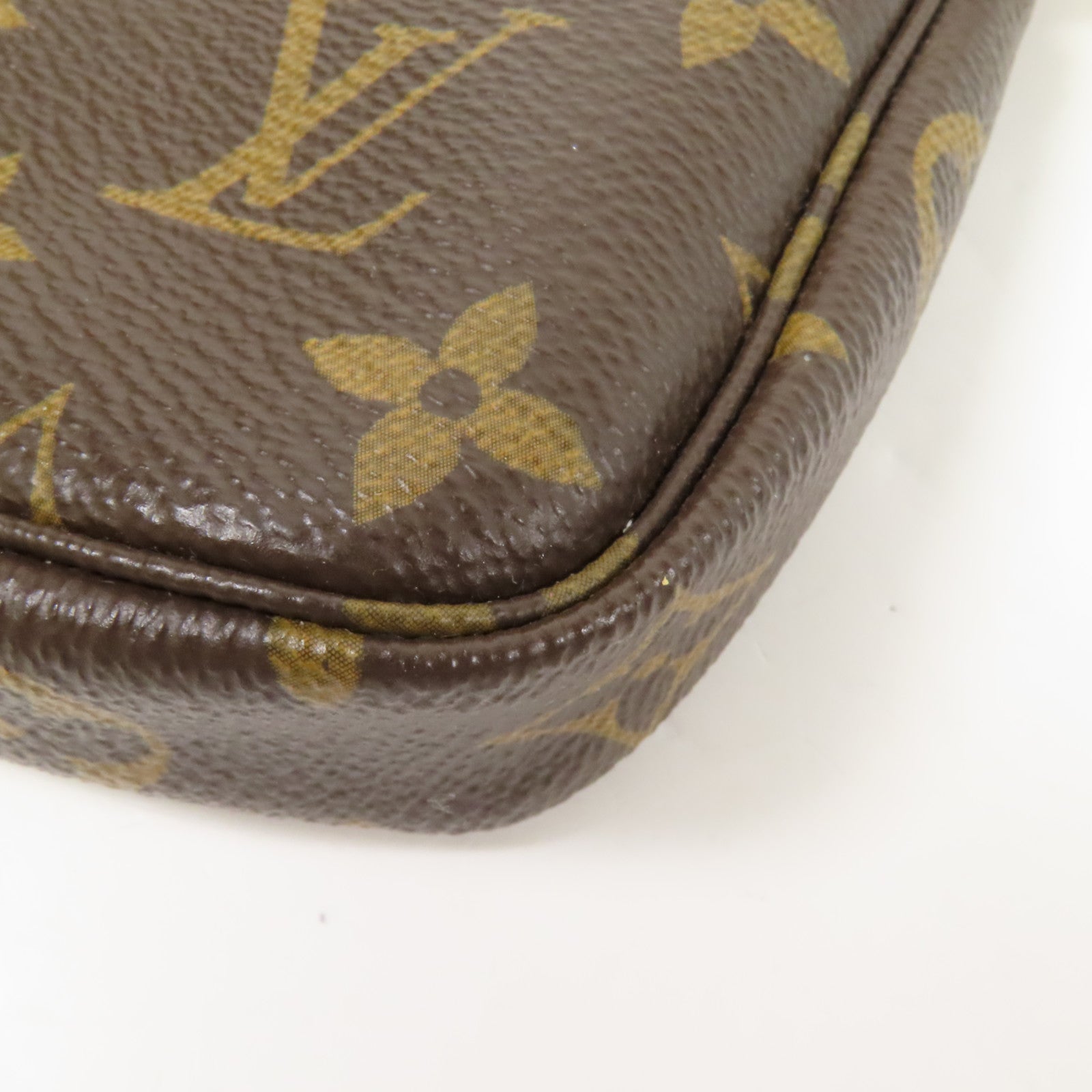 LOUIS VUITTON Monogram Mini Pochette Accessoires金扣手挽袋