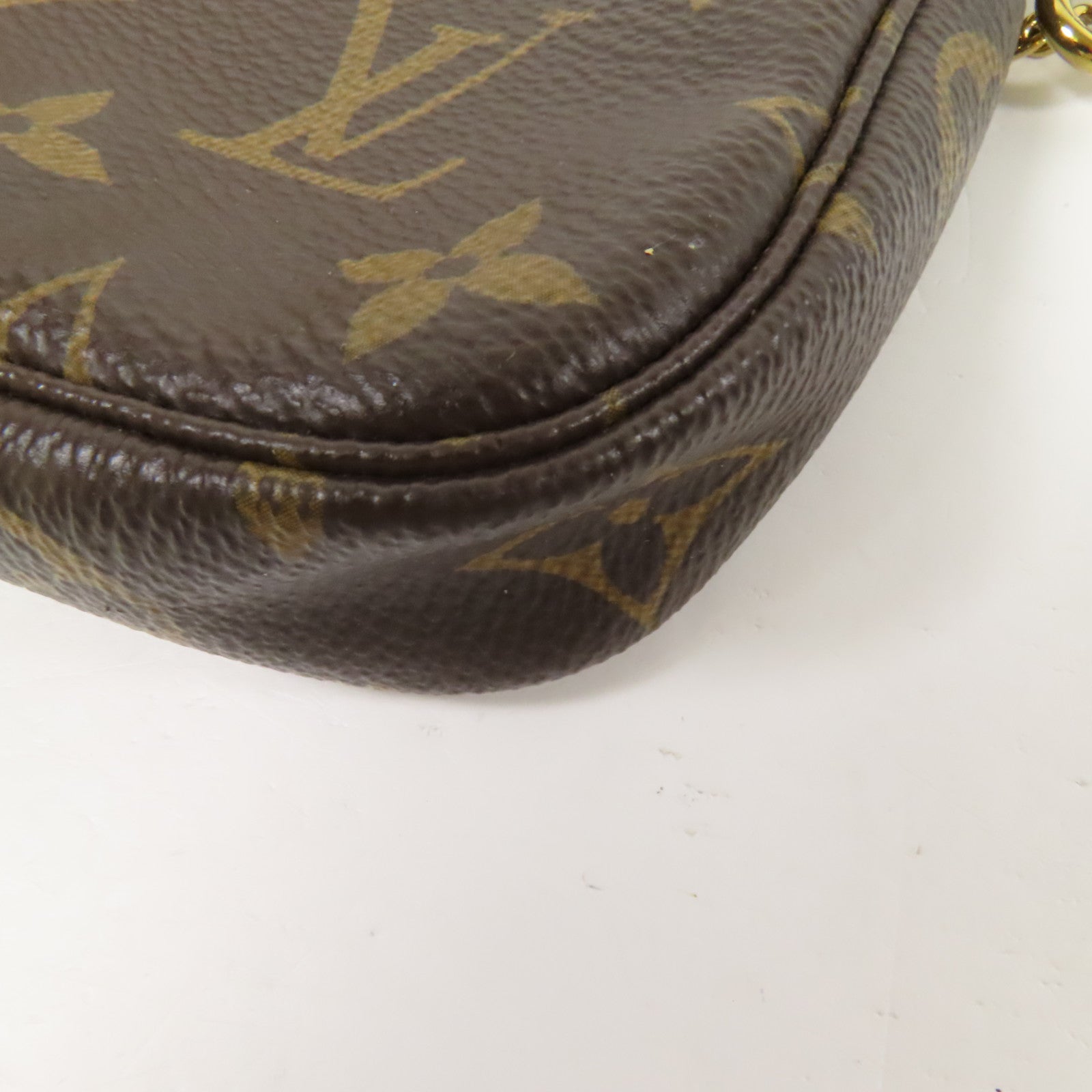 LOUIS VUITTON Monogram Mini Pochette Accessoires金扣手挽袋