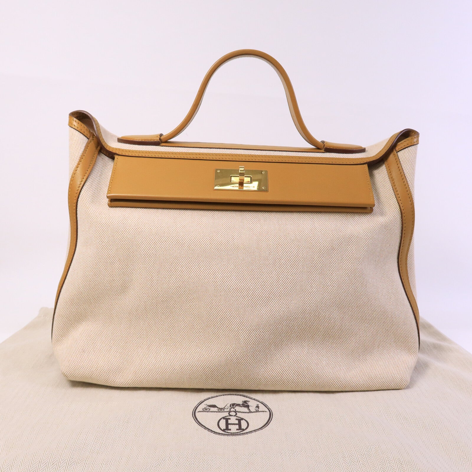 HERMES 帆布/Swift皮革24/24 35CM手挽袋Sesame