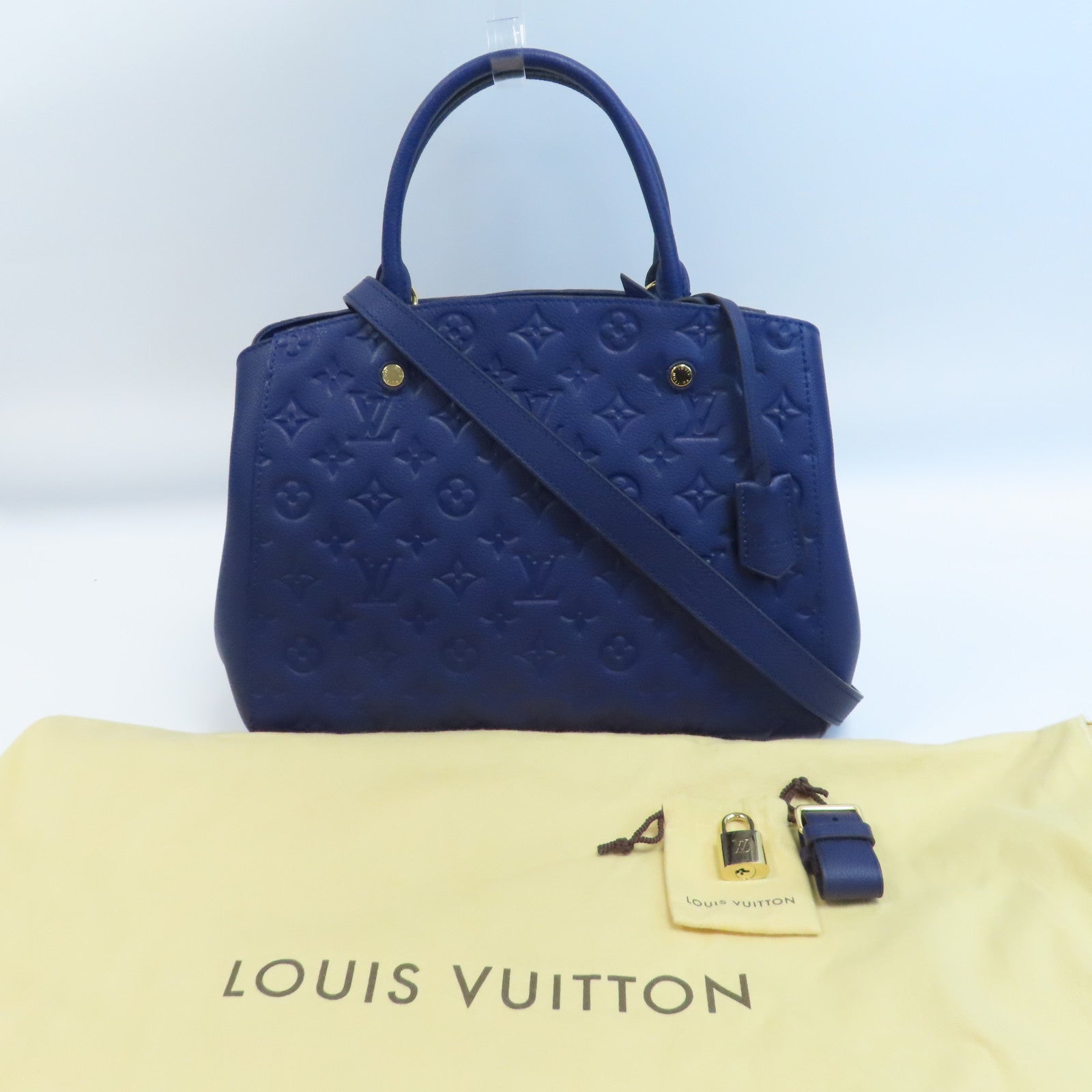 LOUIS VUITTON Monogram Empreinte Montaigne MM金扣手挽肩背兩用袋藍色