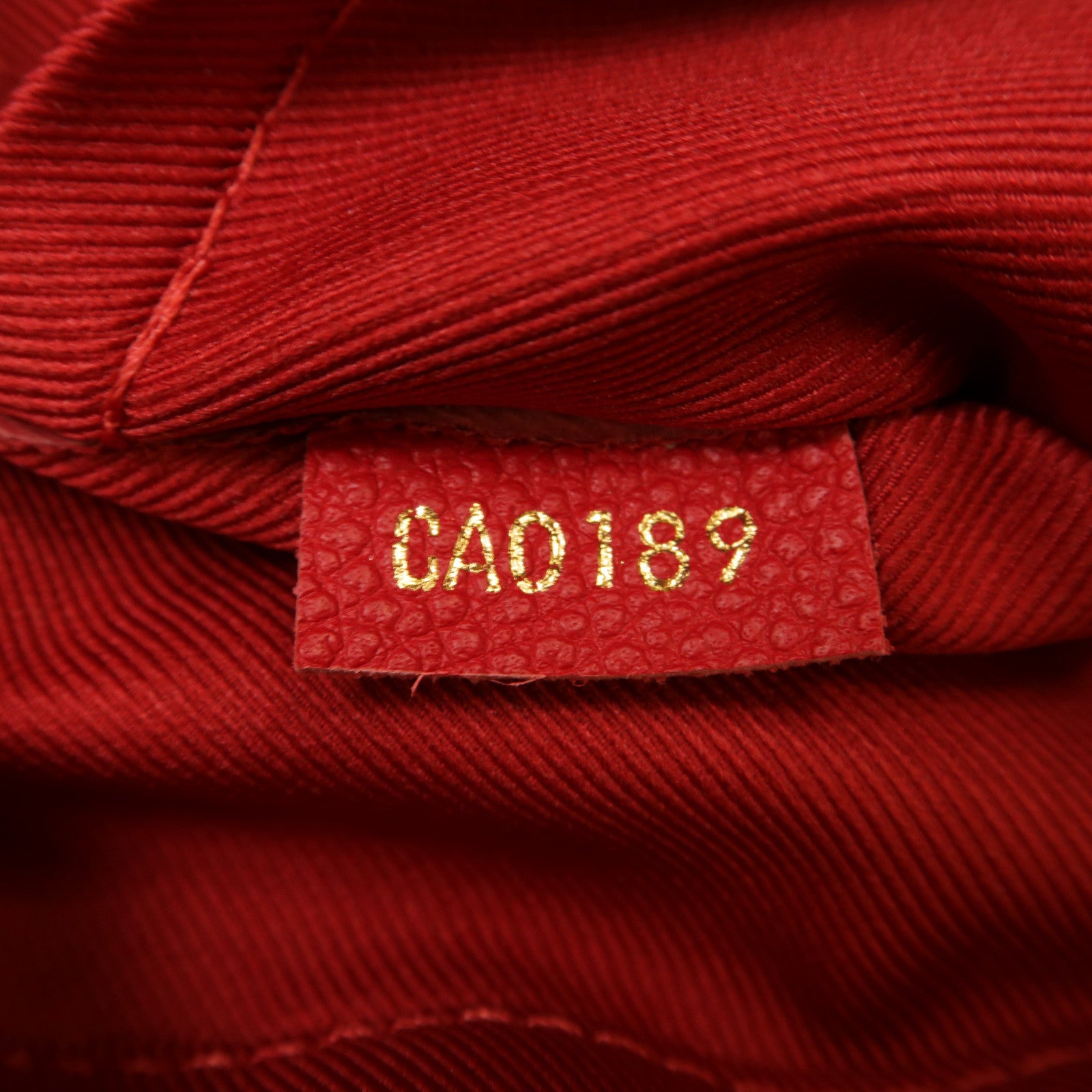 LOUIS VUITTON Monogram Empreinte Saintonge金扣肩背袋紅色