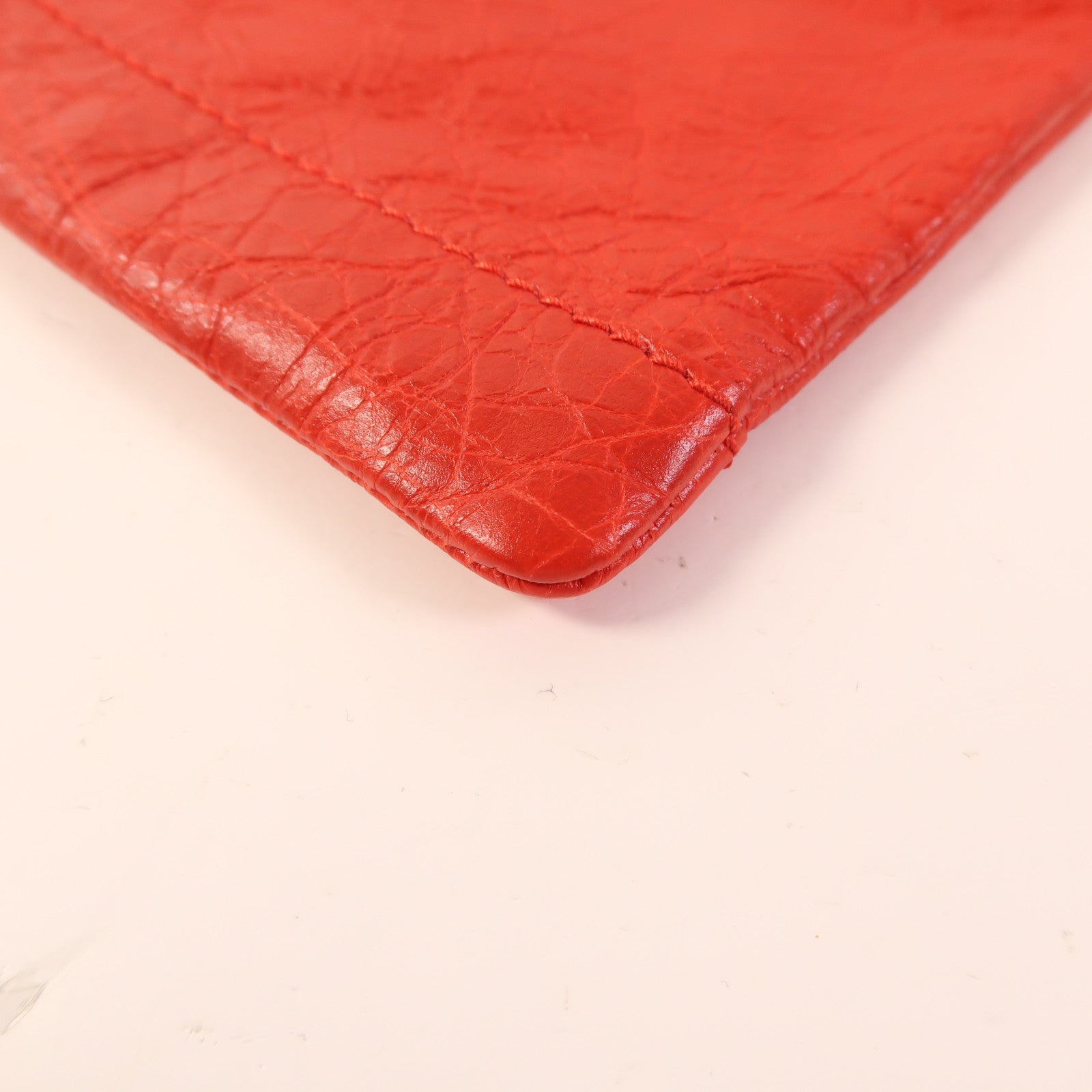 BALENCIAGA 牛皮皮革Pouch金扣手拿包