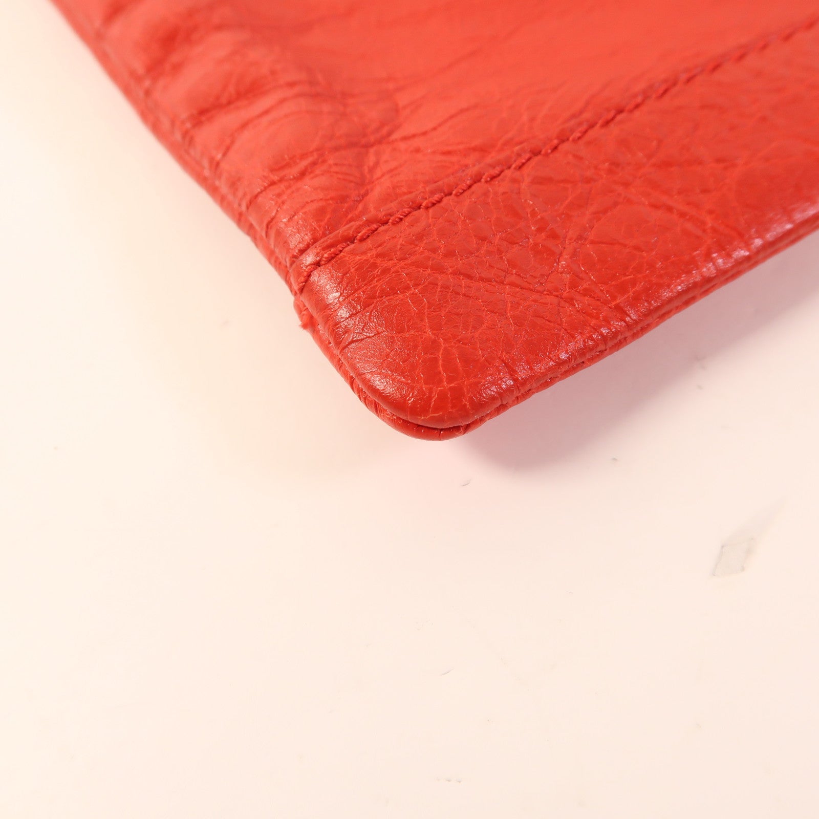 BALENCIAGA 牛皮皮革Pouch金扣手拿包