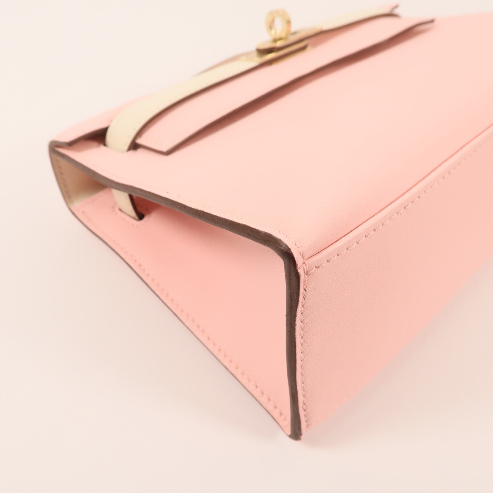 HERMES Swift皮革Mini Kelly Pochette金扣手挽袋Rose Sakura/Nata