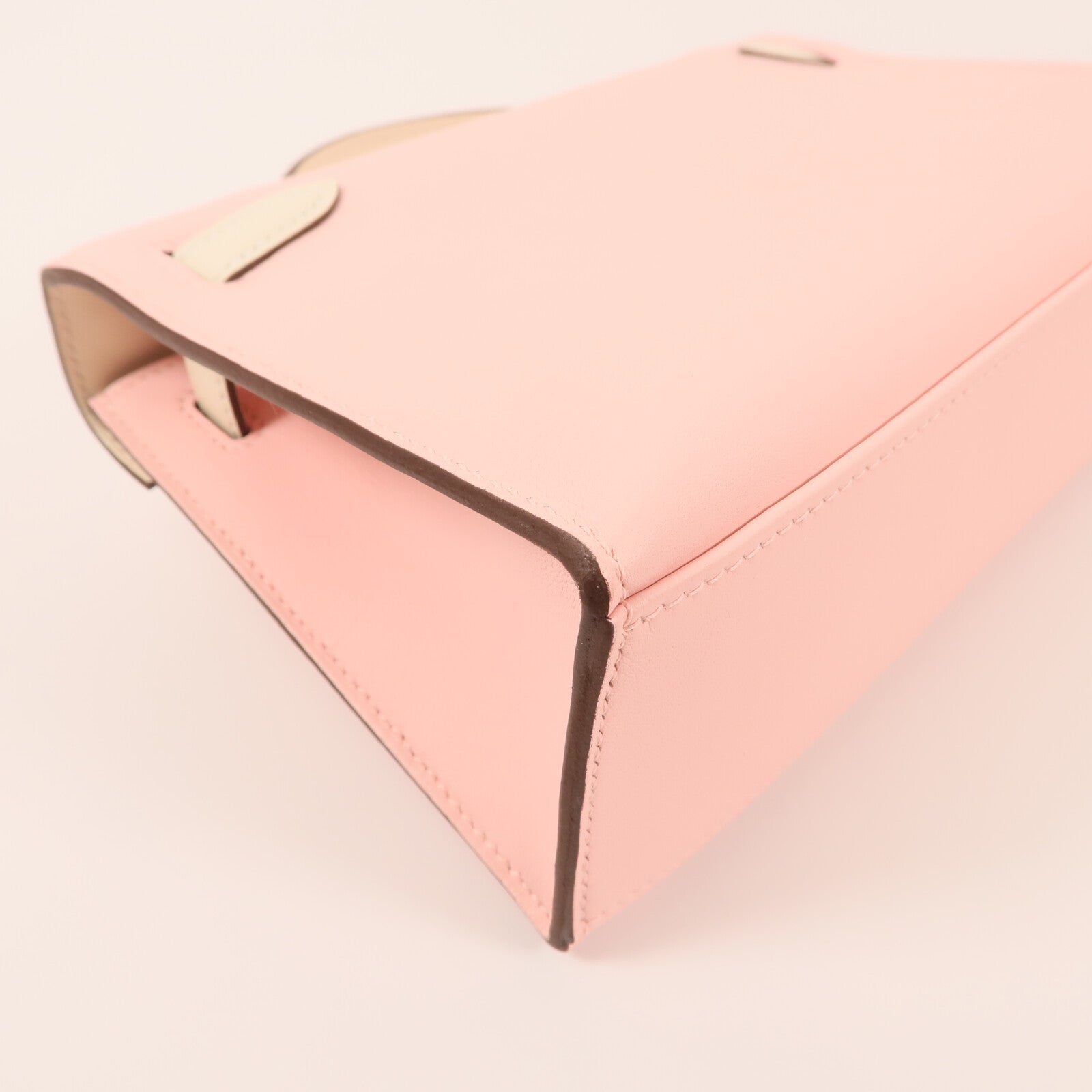 HERMES Swift皮革Mini Kelly Pochette金扣手挽袋Rose Sakura/Nata