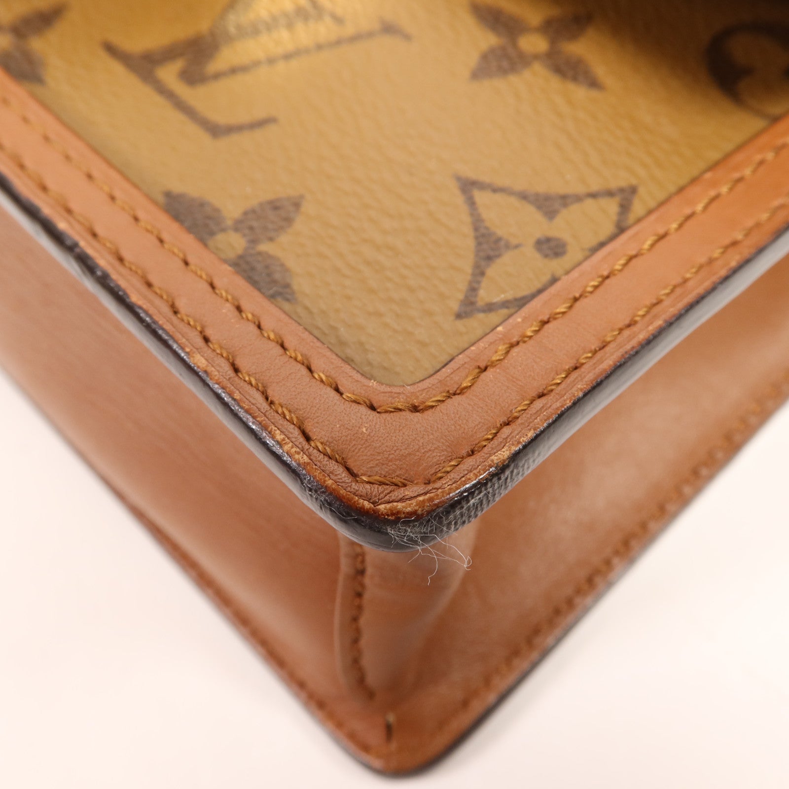 LOUIS VUITTON Monogram Reverse Dauphine金扣肩背袋