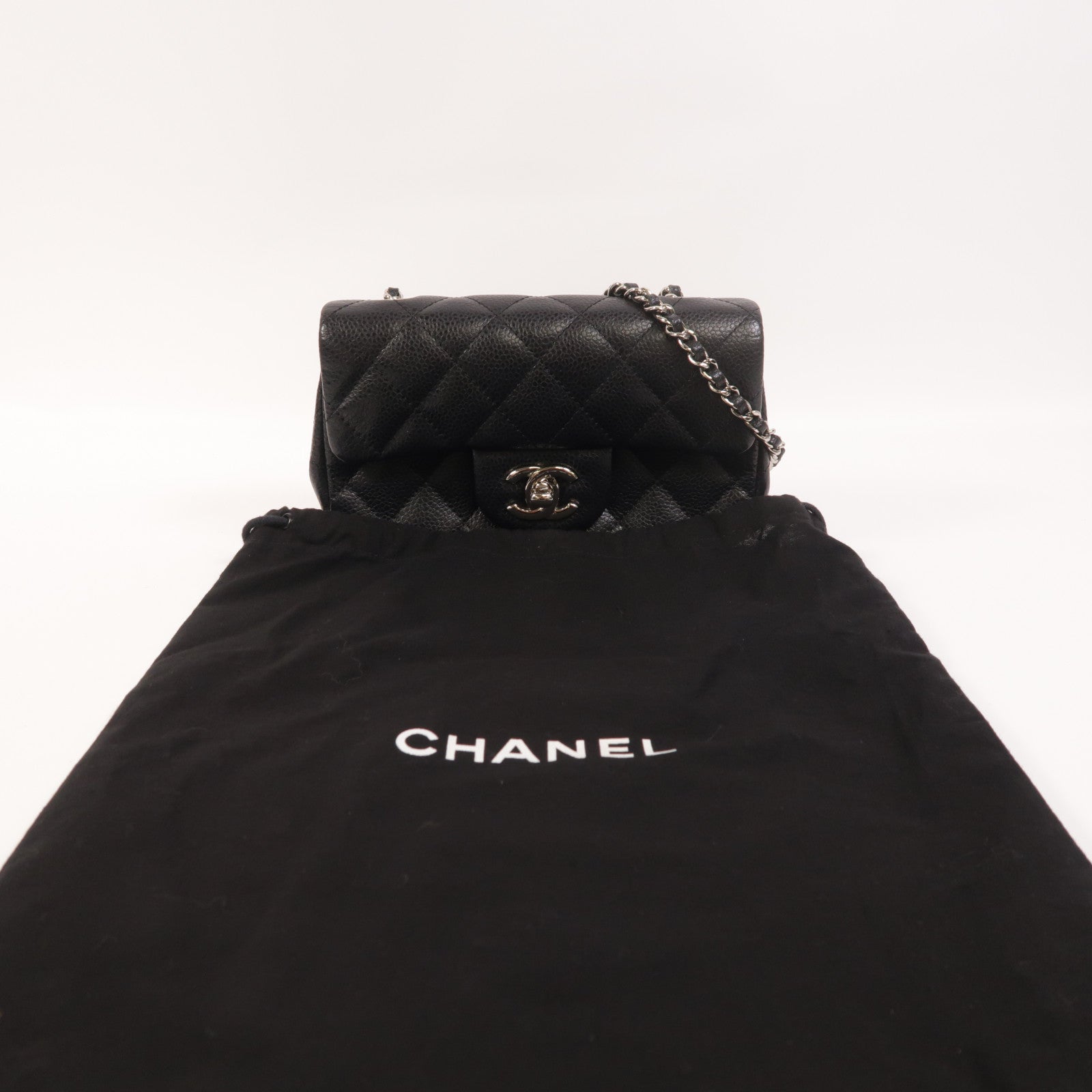 CHANEL 牛皮皮革Classic Extra Mini Flap Bag銀扣鏈帶肩背袋