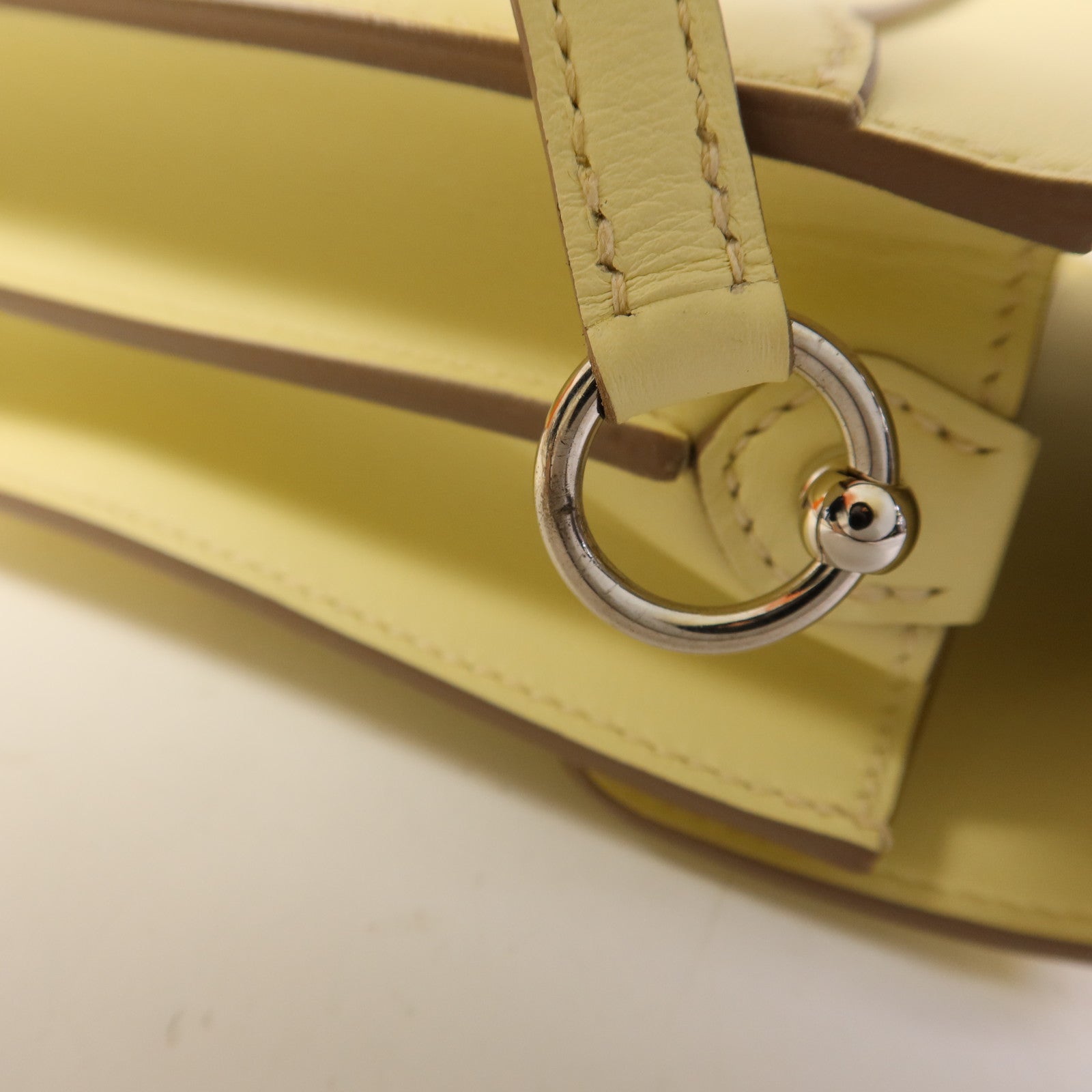 HERMES Swift皮革Roulis Mini銀扣肩背袋Jaune Milton