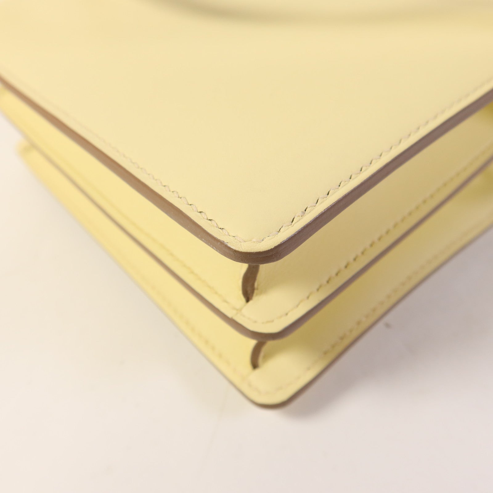 HERMES Swift皮革Roulis Mini銀扣肩背袋Jaune Milton