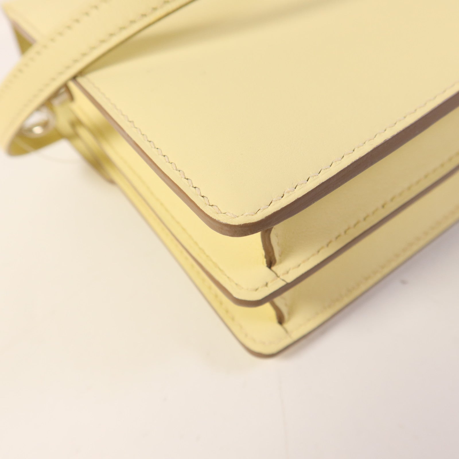 HERMES Swift皮革Roulis Mini銀扣肩背袋Jaune Milton