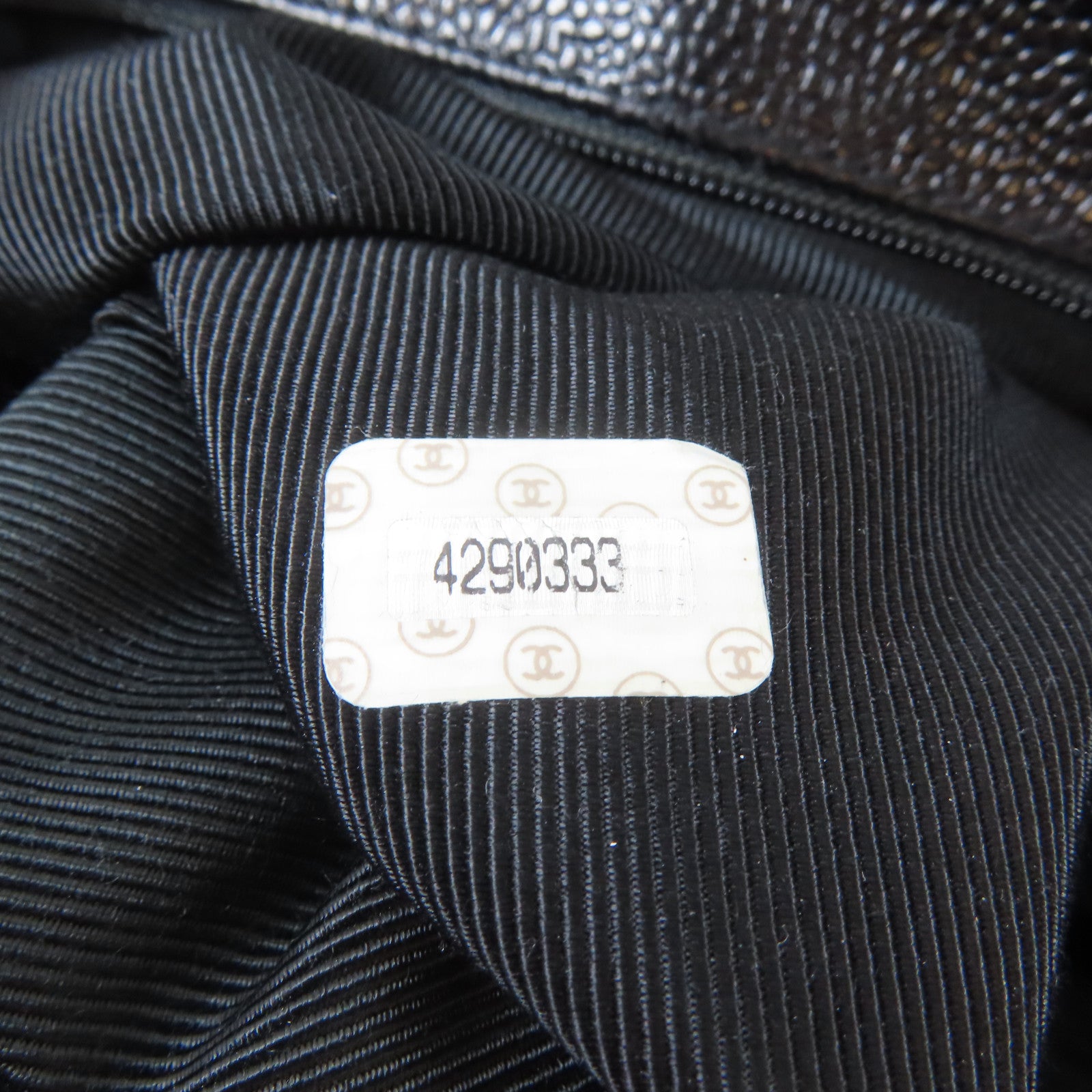 CHANEL Caviar皮革Triple CC Backpack金扣背包黑色