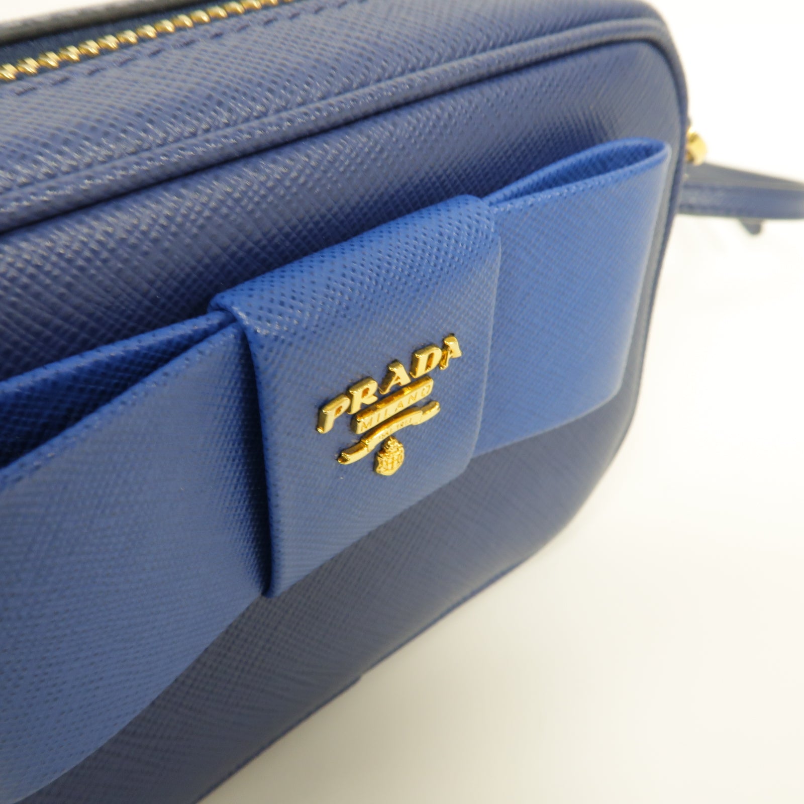PRADA Saffiano皮革Mini Bag金扣肩背袋藍色