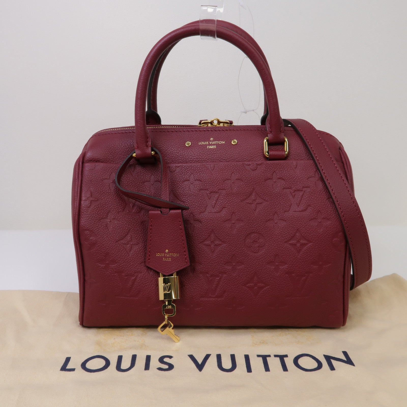 LOUIS VUITTON Monogram Empreinte Speedy Bandouliere 30金扣手挽肩背兩用袋紫紅色
