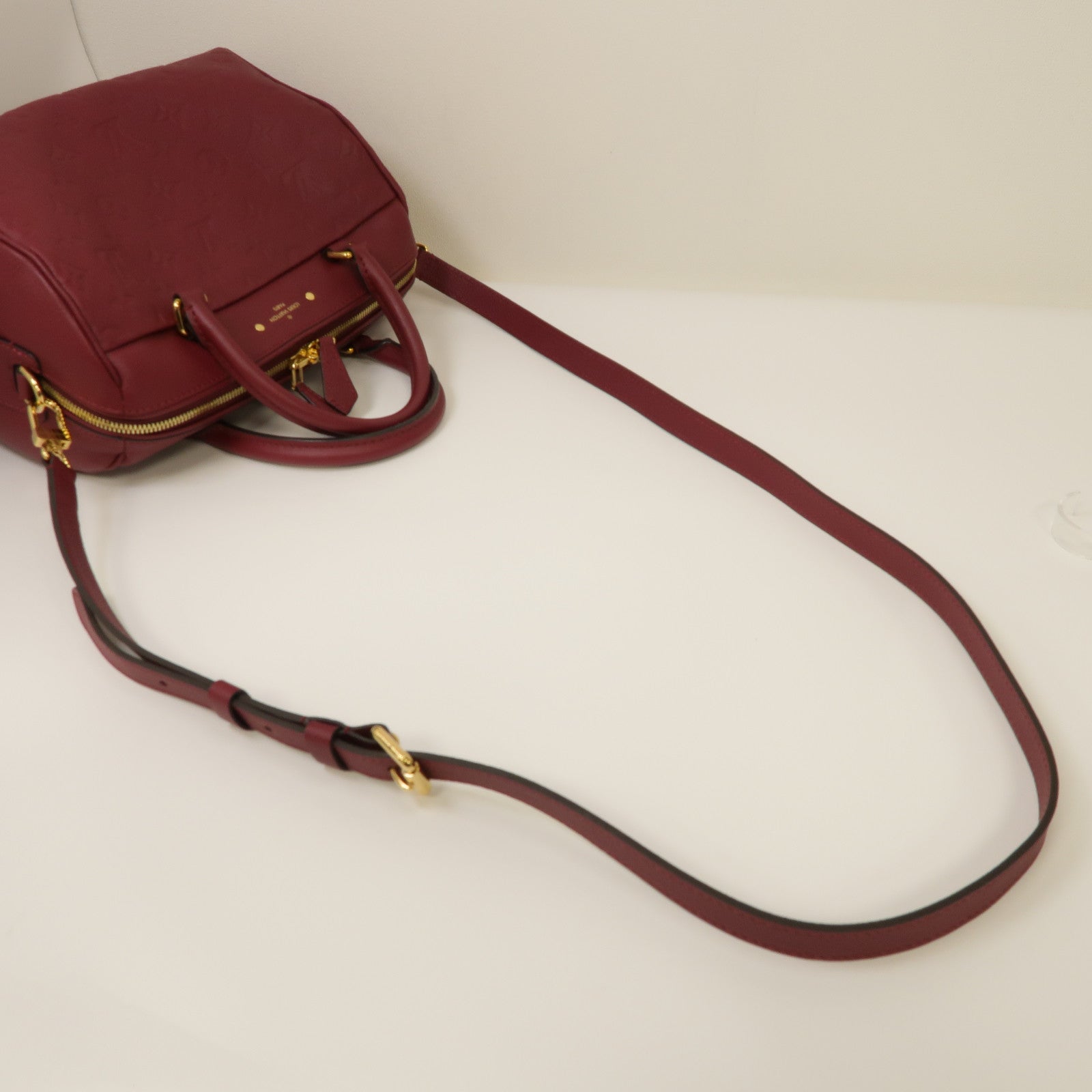 LOUIS VUITTON Monogram Empreinte Speedy Bandouliere 30金扣手挽肩背兩用袋紫紅色