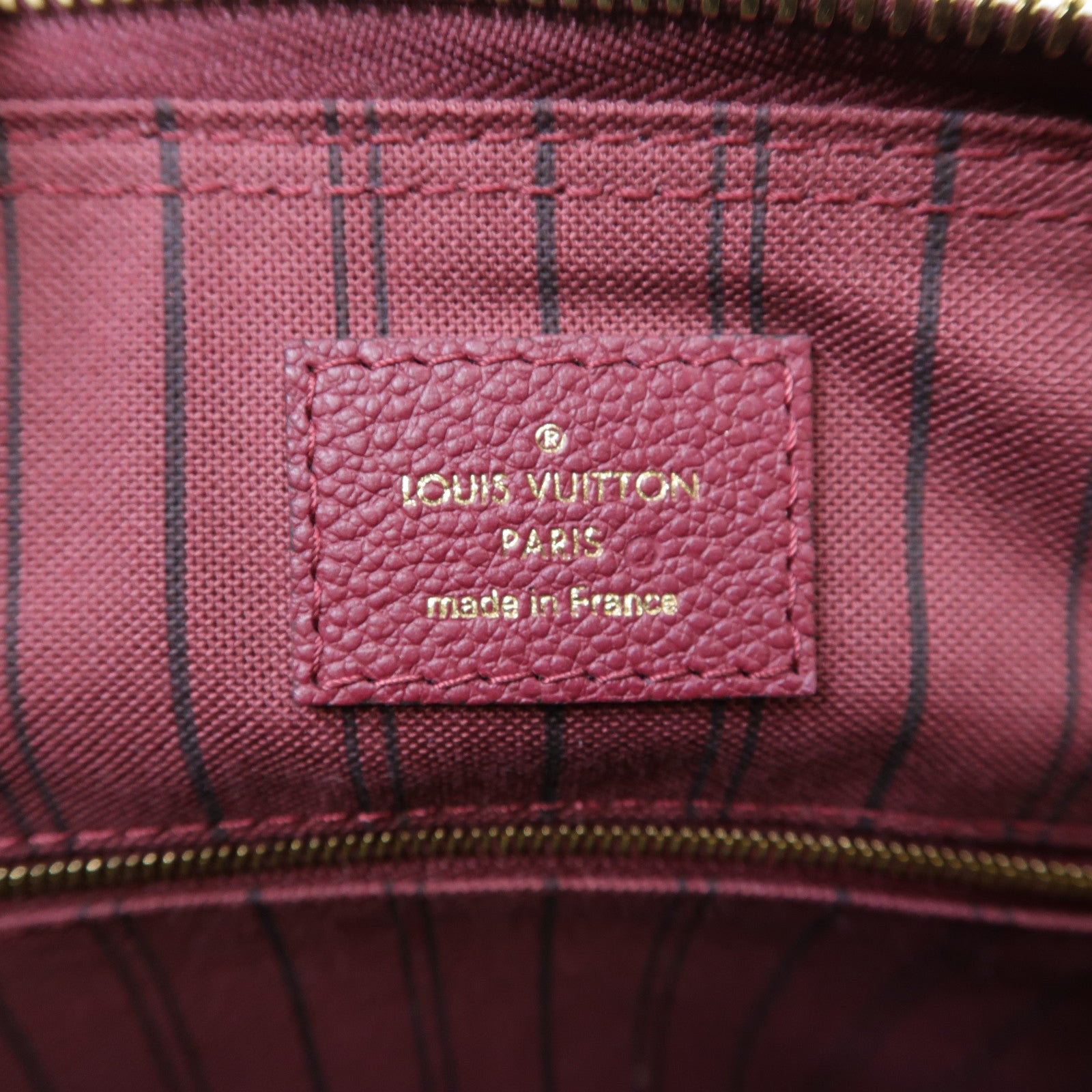 LOUIS VUITTON Monogram Empreinte Speedy Bandouliere 30金扣手挽肩背兩用袋紫紅色