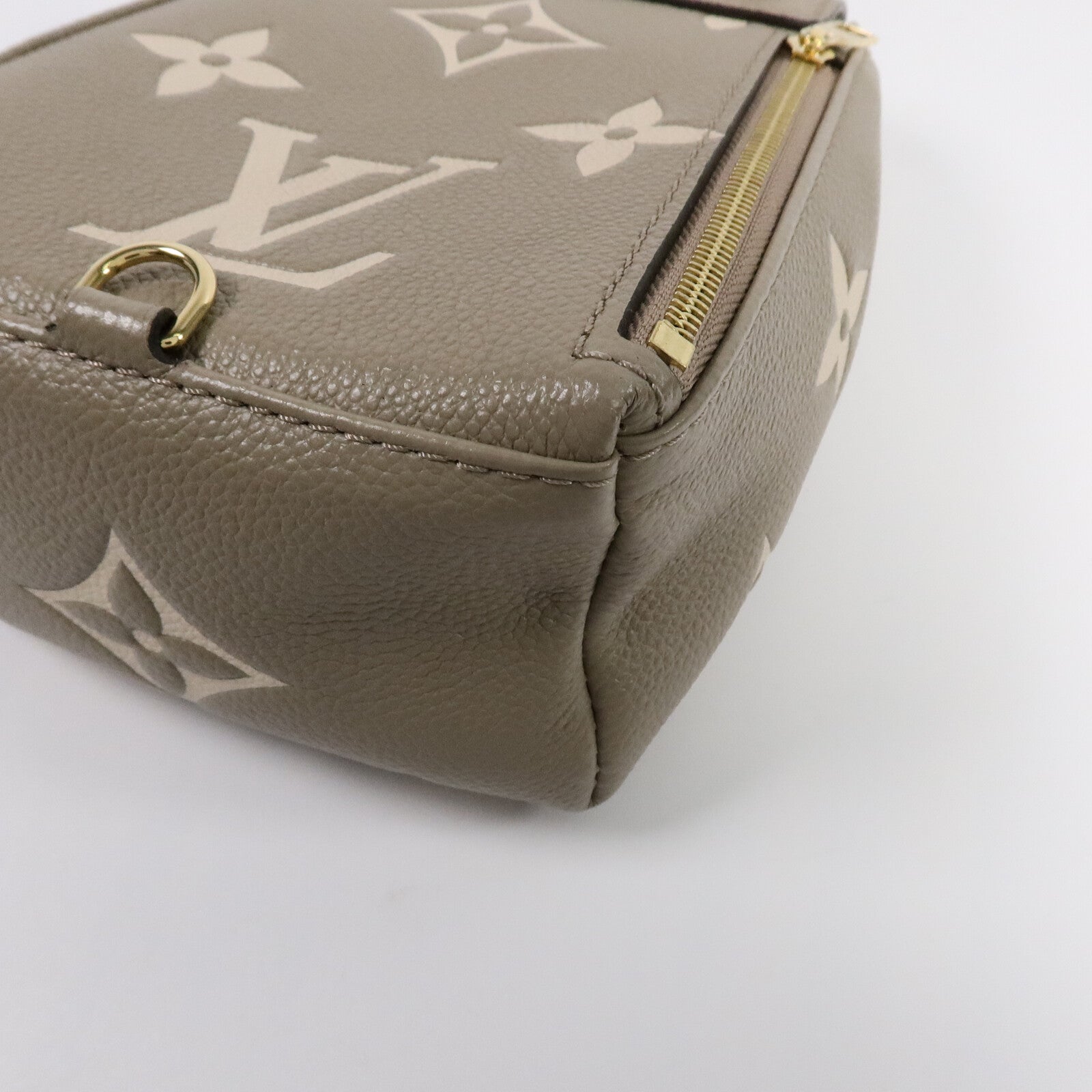 LOUIS VUITTON Monogram Empreinte Tiny Backpack背包