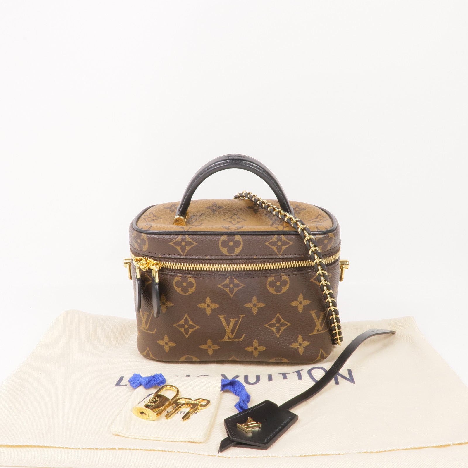 LOUIS VUITTON Monogram/Monogram Reverse Vanity PM金扣手挽肩背兩用袋棕色