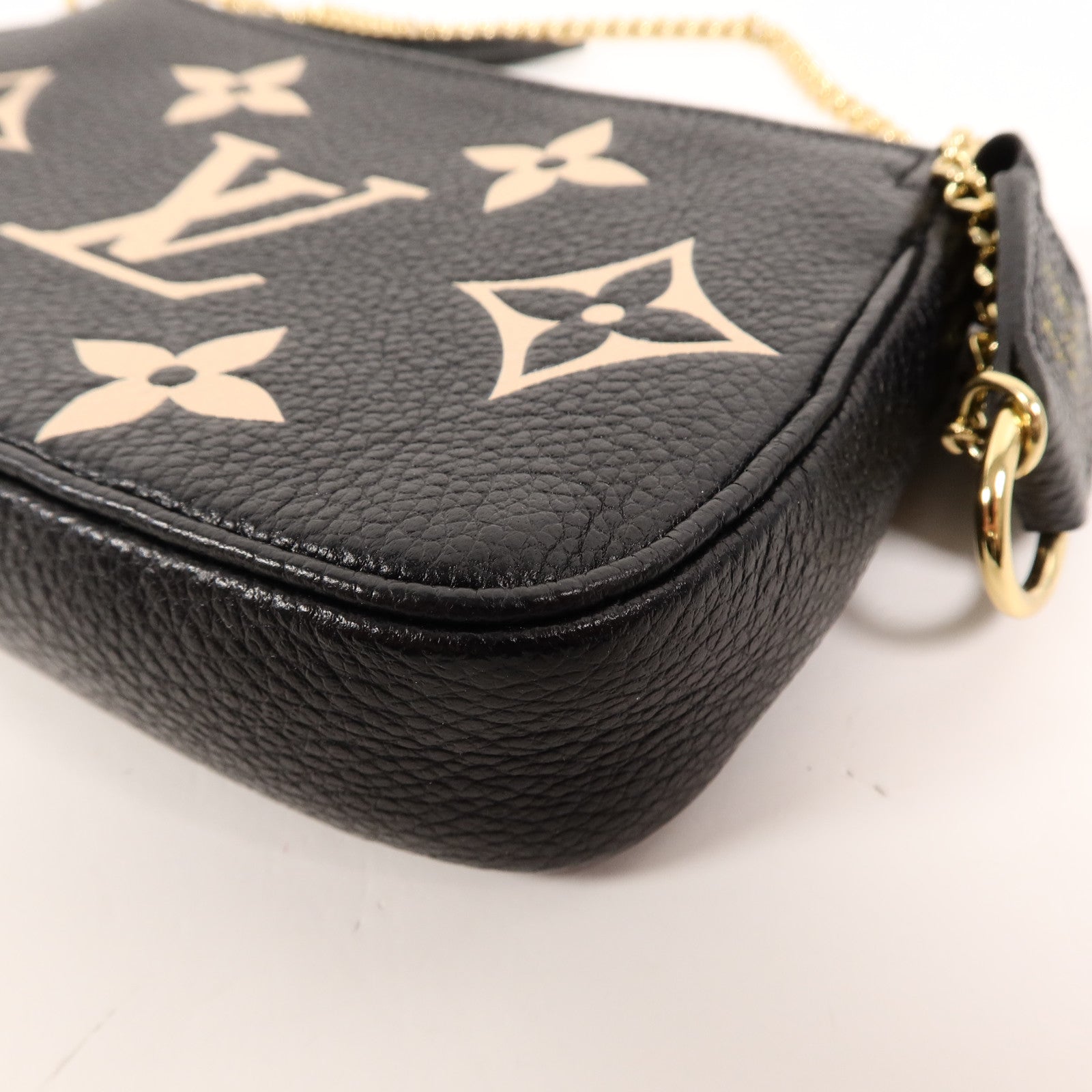 LOUIS VUITTON Monogram Empreinte Mini Pochette鏈帶手挽袋