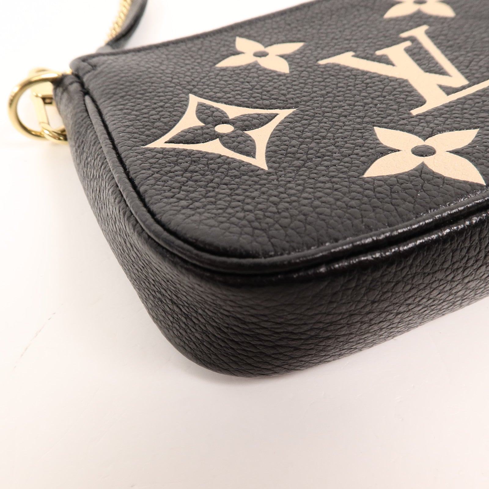 LOUIS VUITTON Monogram Empreinte Mini Pochette鏈帶手挽袋