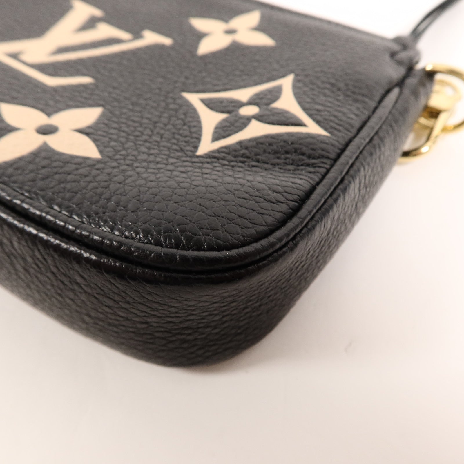 LOUIS VUITTON Monogram Empreinte Mini Pochette鏈帶手挽袋