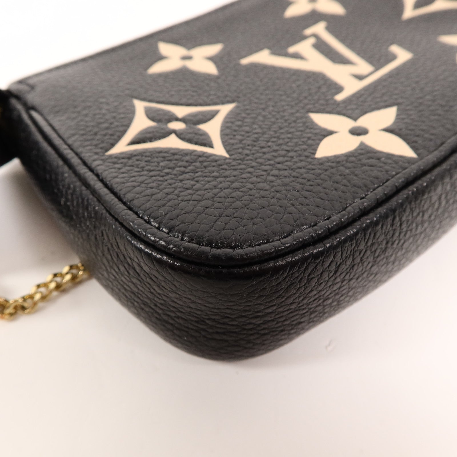 LOUIS VUITTON Monogram Empreinte Mini Pochette鏈帶手挽袋