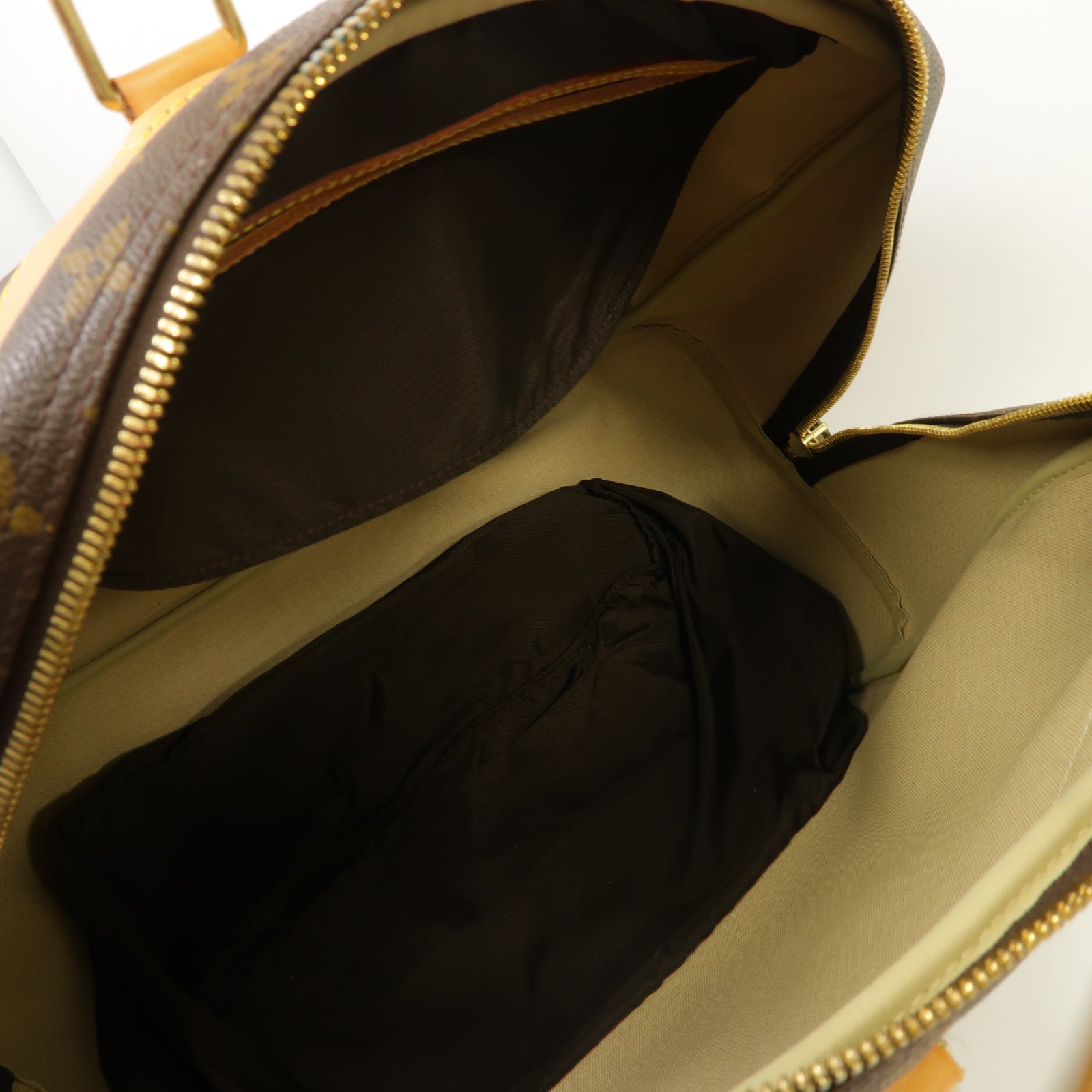 LOUIS VUITTON Monogram Evasion金扣手挽袋棕色