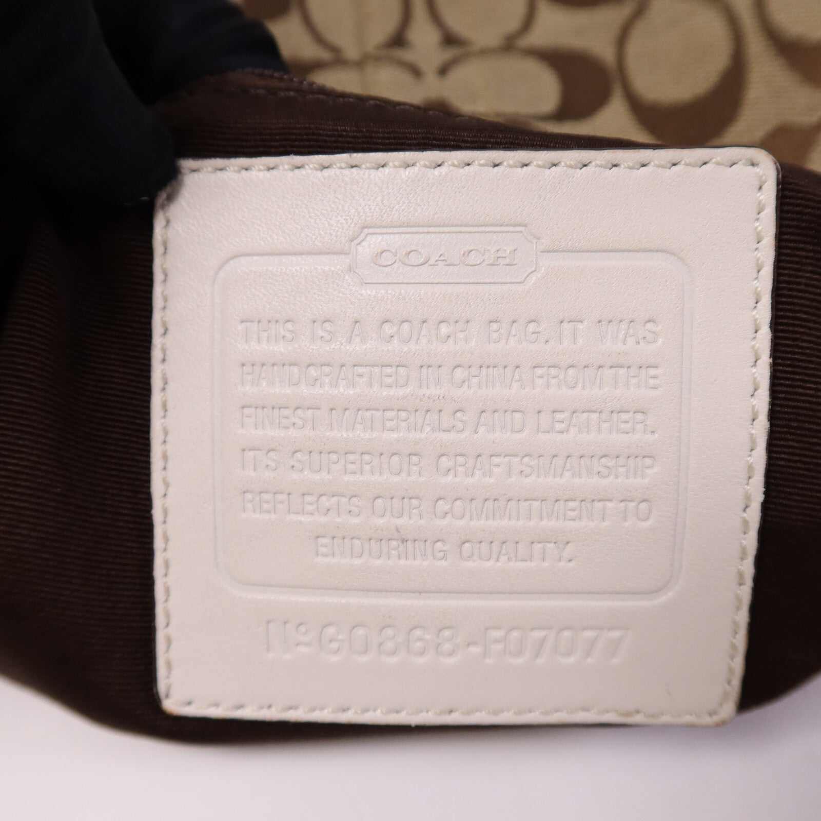 COACH 帆布Soho Hobo銀扣肩背袋