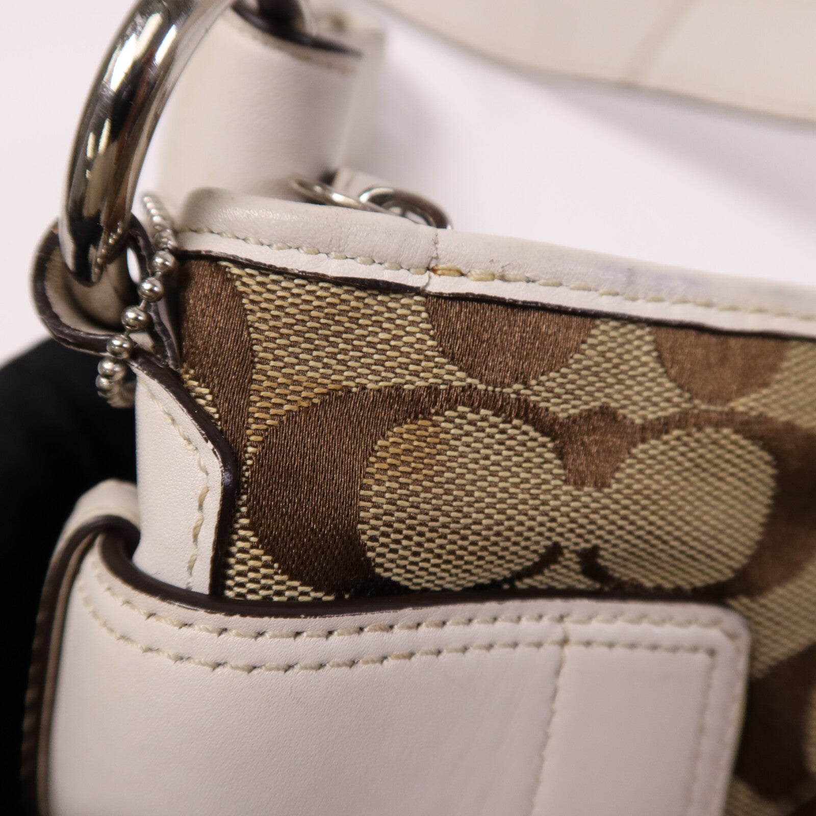 COACH 帆布Soho Hobo銀扣肩背袋