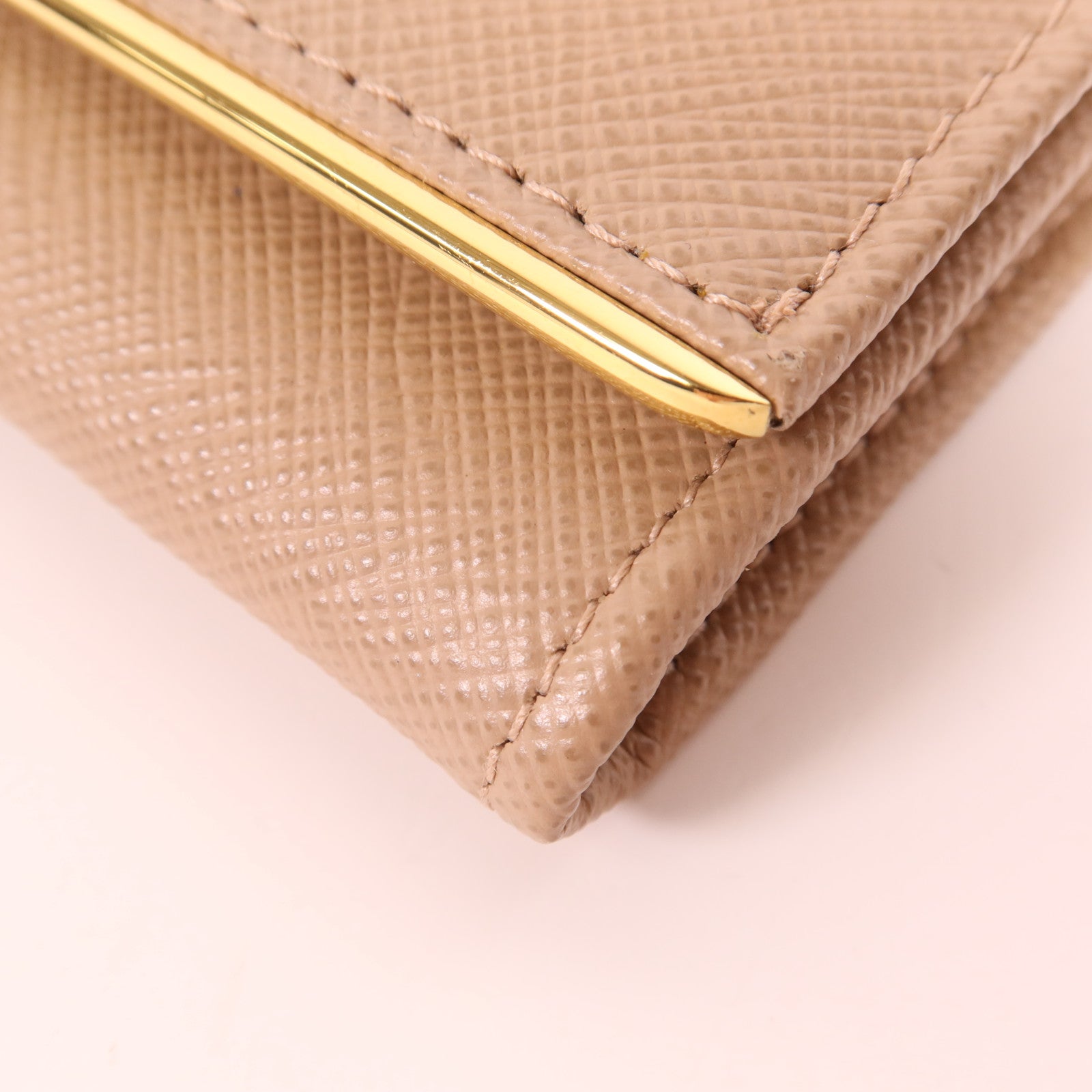 PRADA 牛皮皮革WOC金扣鏈肩背袋