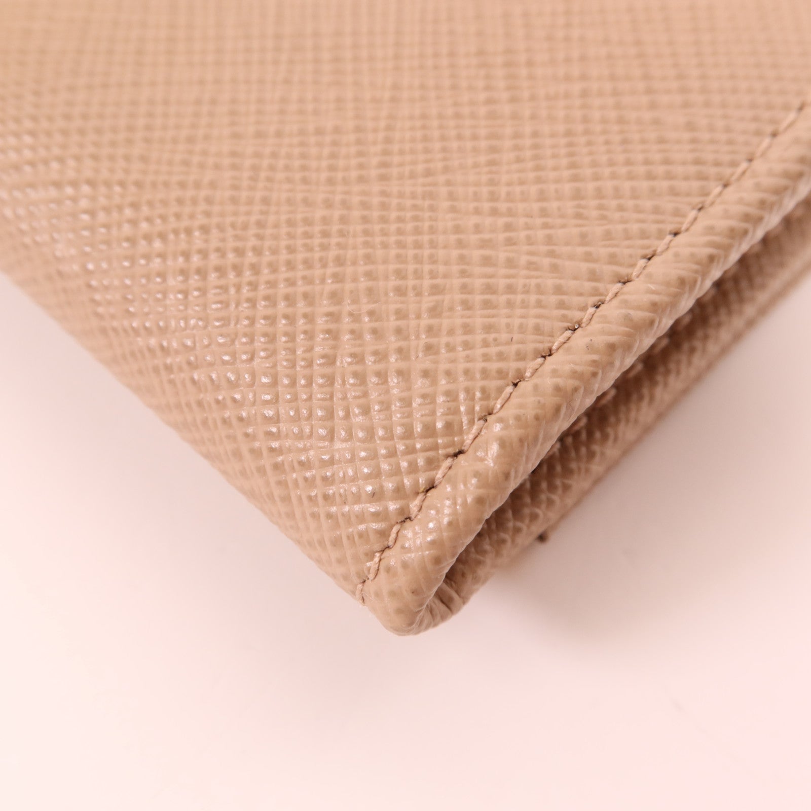 PRADA 牛皮皮革WOC金扣鏈肩背袋