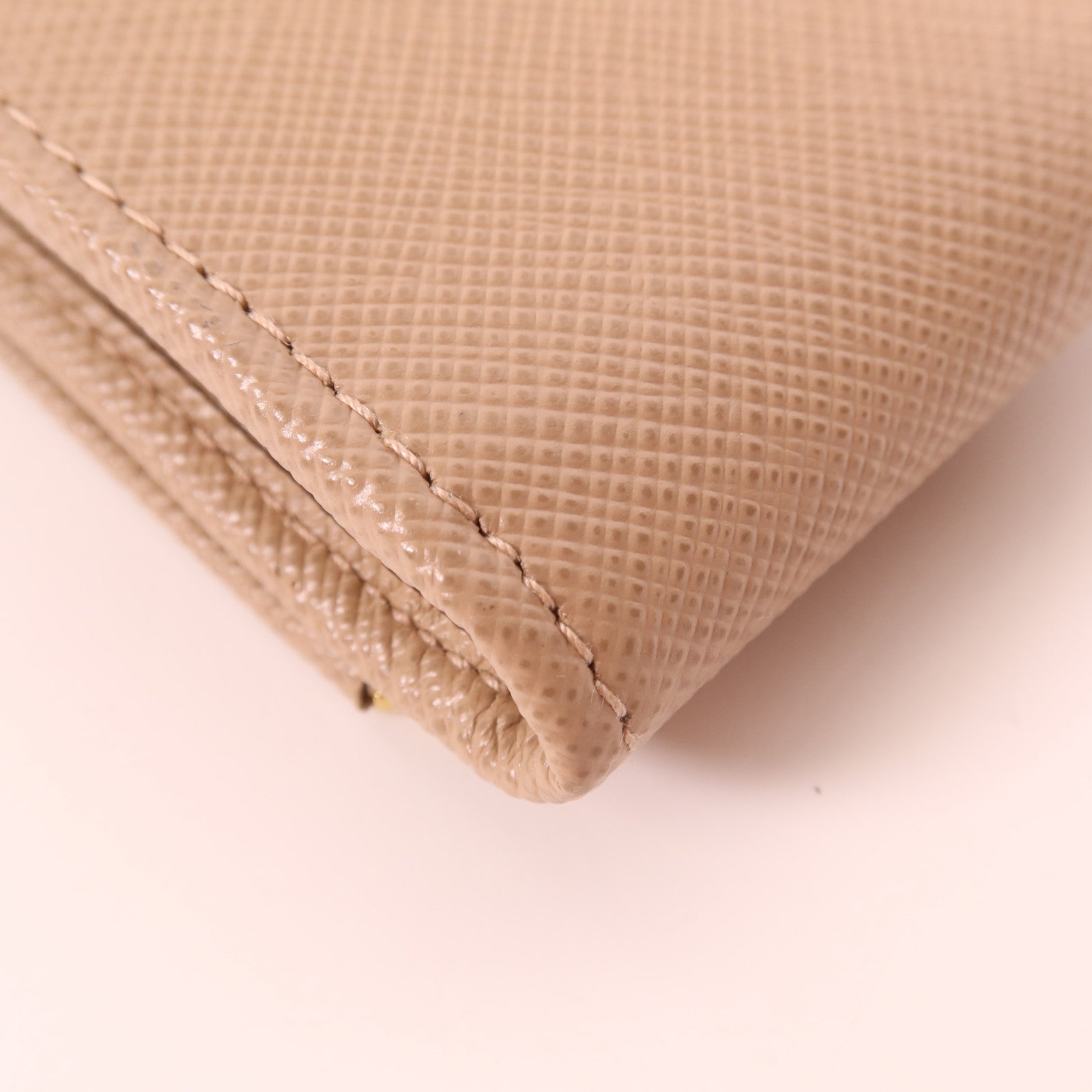 PRADA 牛皮皮革WOC金扣鏈肩背袋