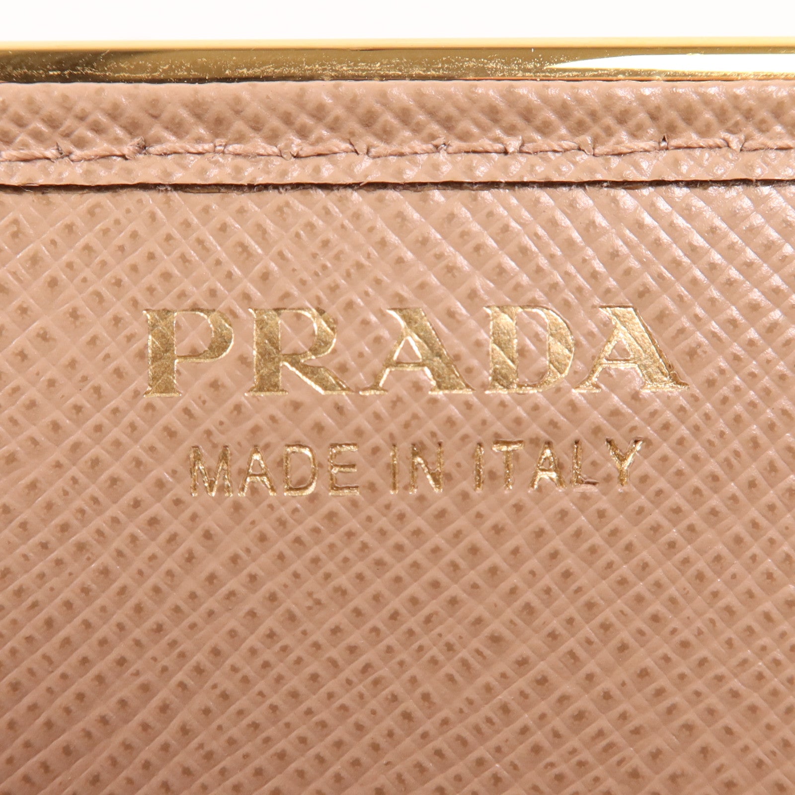 PRADA 牛皮皮革WOC金扣鏈肩背袋