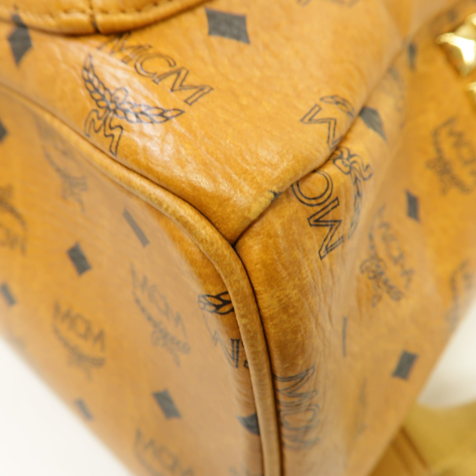 MCM 塗層帆布Backpack金扣背包棕色