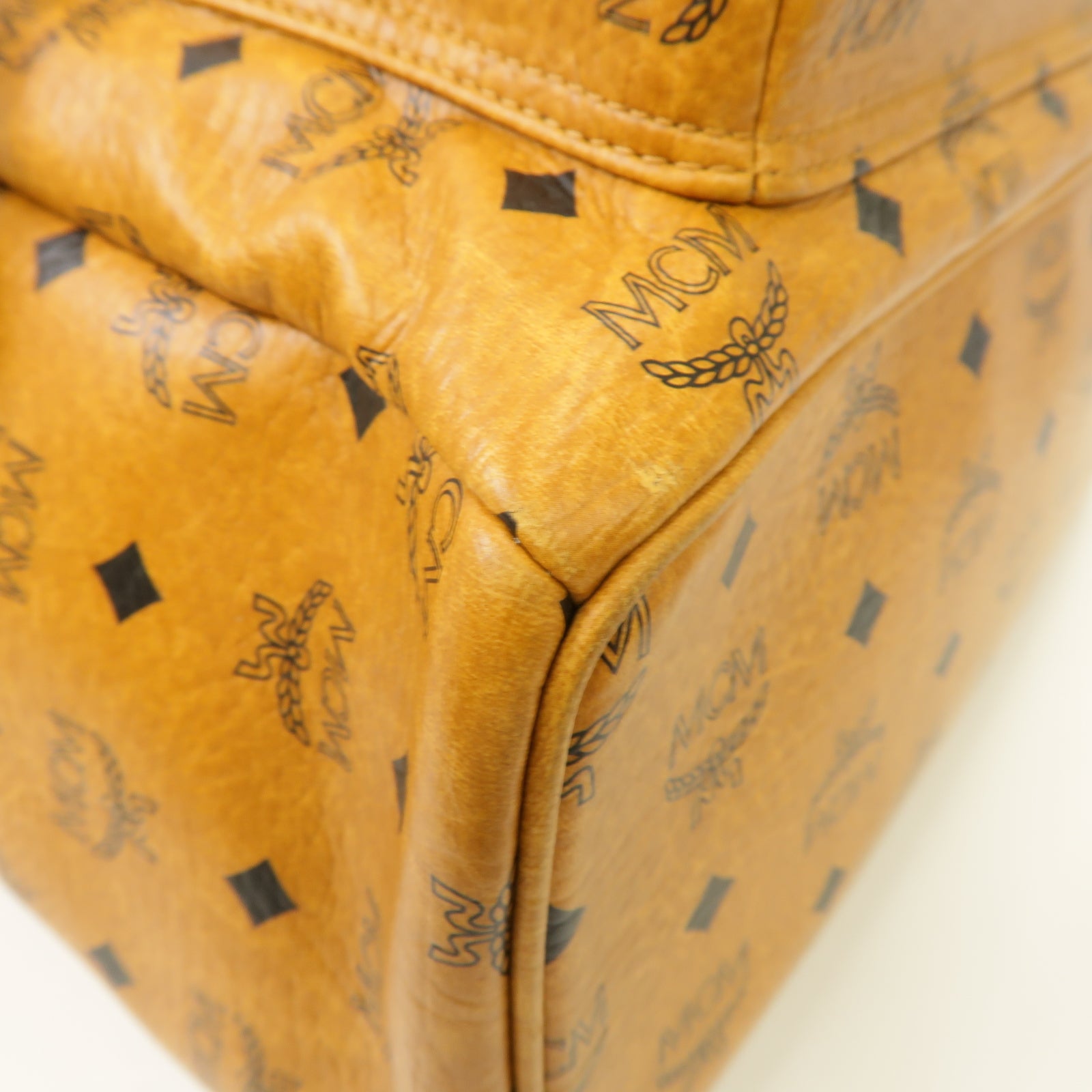 MCM 塗層帆布Backpack金扣背包棕色