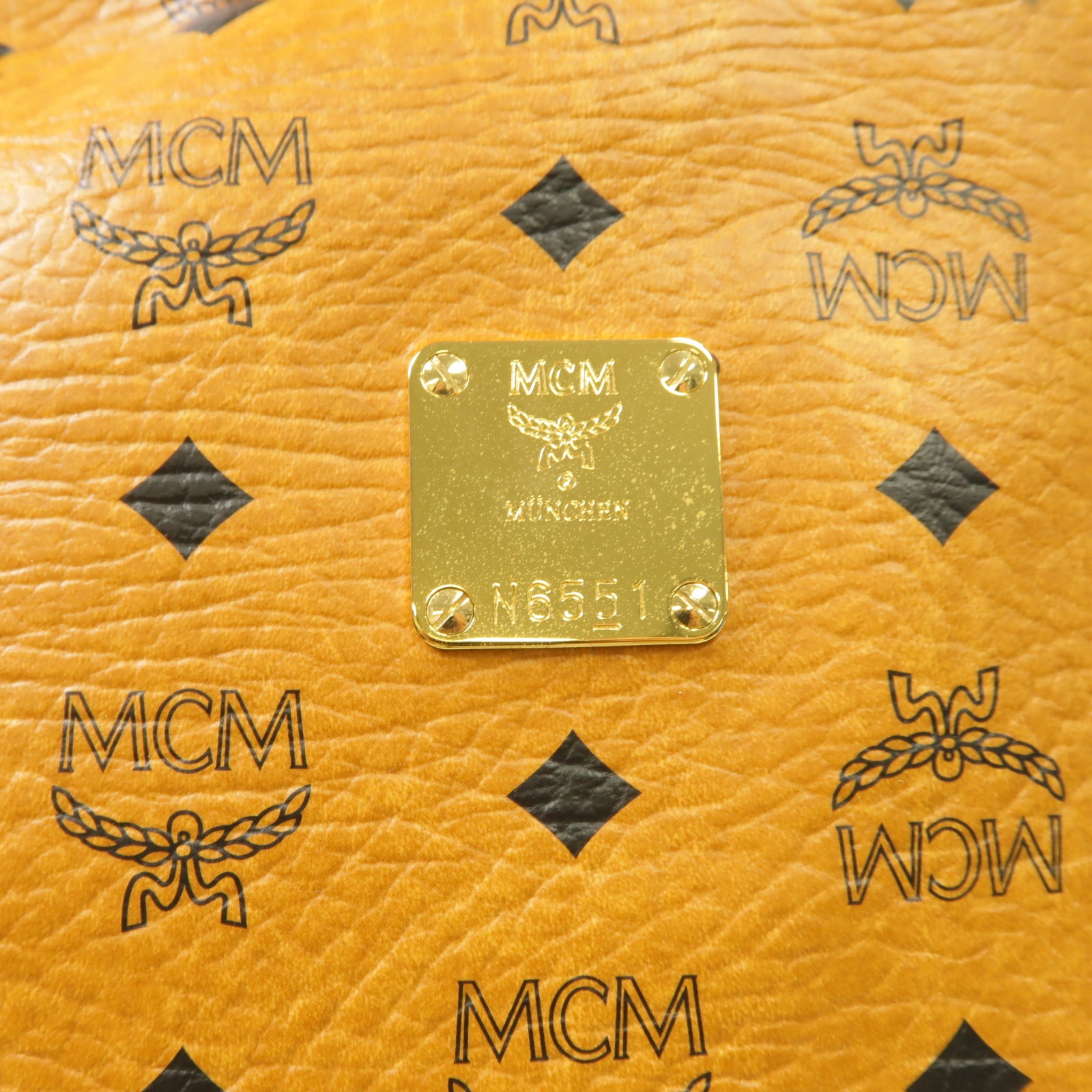 MCM 塗層帆布Backpack金扣背包棕色