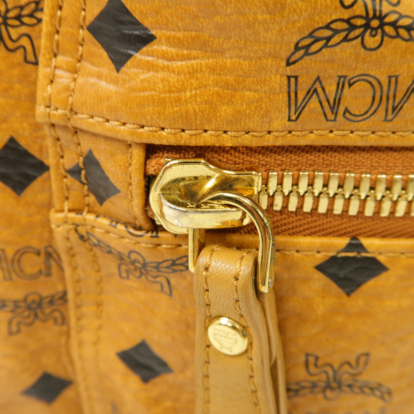 MCM 塗層帆布Backpack金扣背包棕色