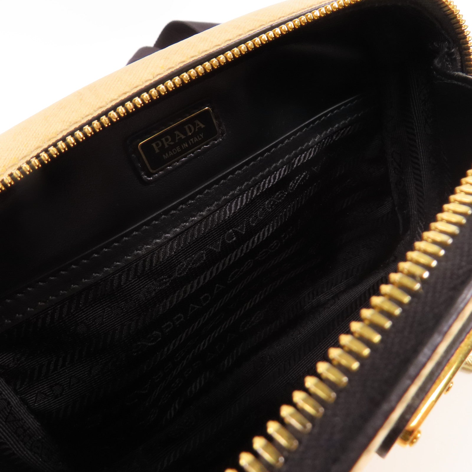 PRADA 牛皮皮革Brique Bag金扣肩背袋