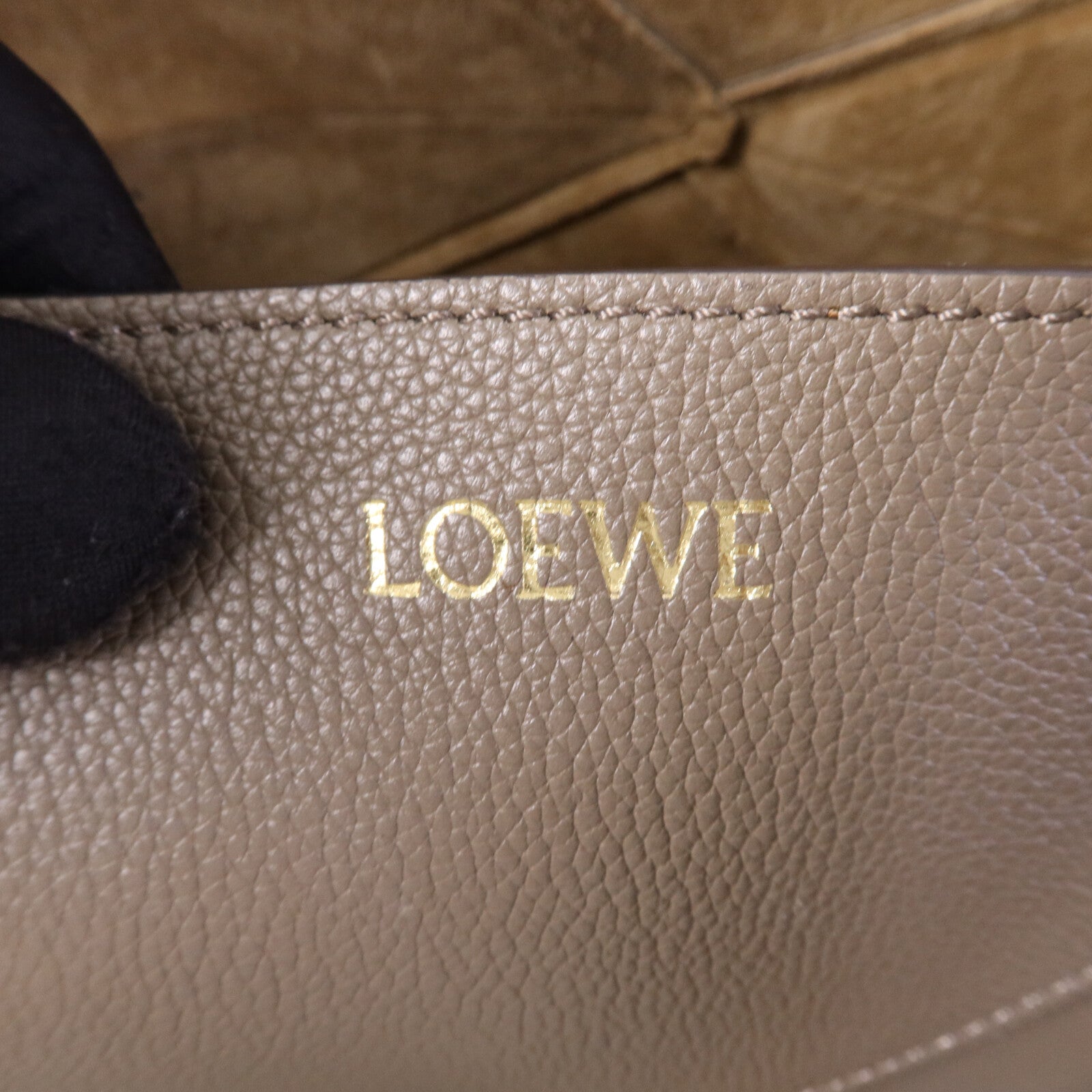 LOEWE 牛皮皮革Puzzle Fold金扣手挽袋