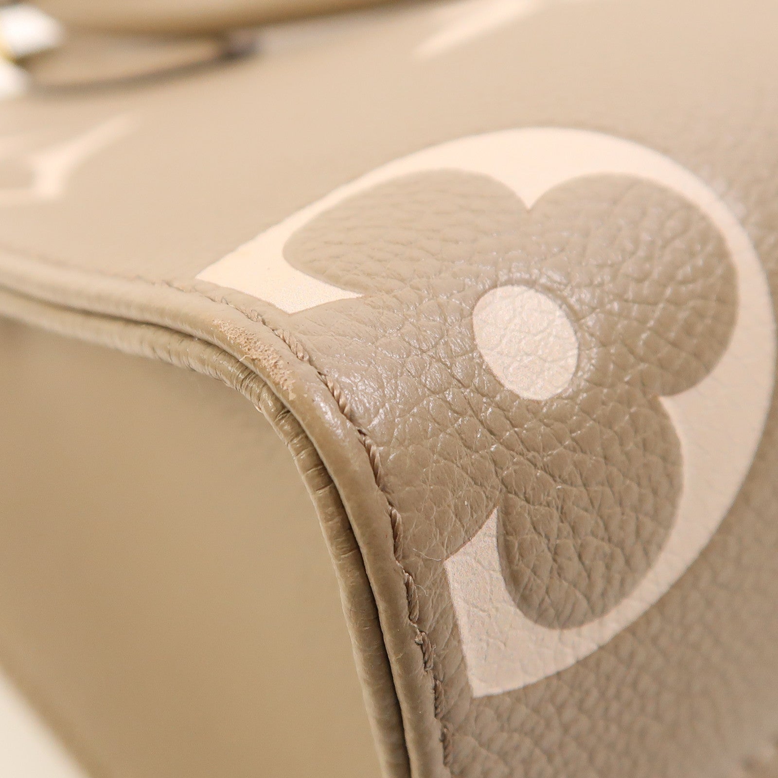 LOUIS VUITTON Monogram Empreinte OnTheGo PM金扣手挽袋