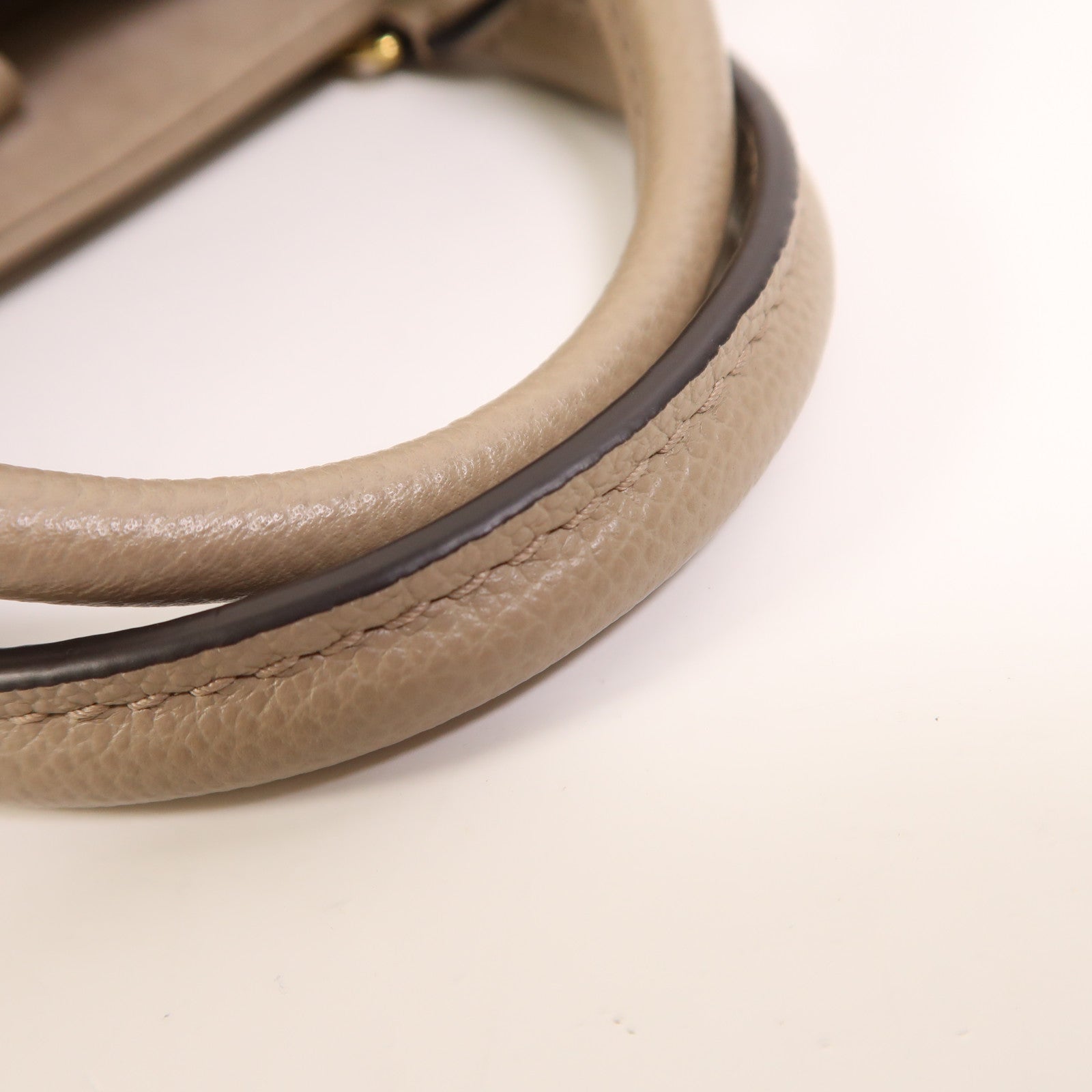 LOUIS VUITTON Monogram Empreinte OnTheGo PM金扣手挽袋